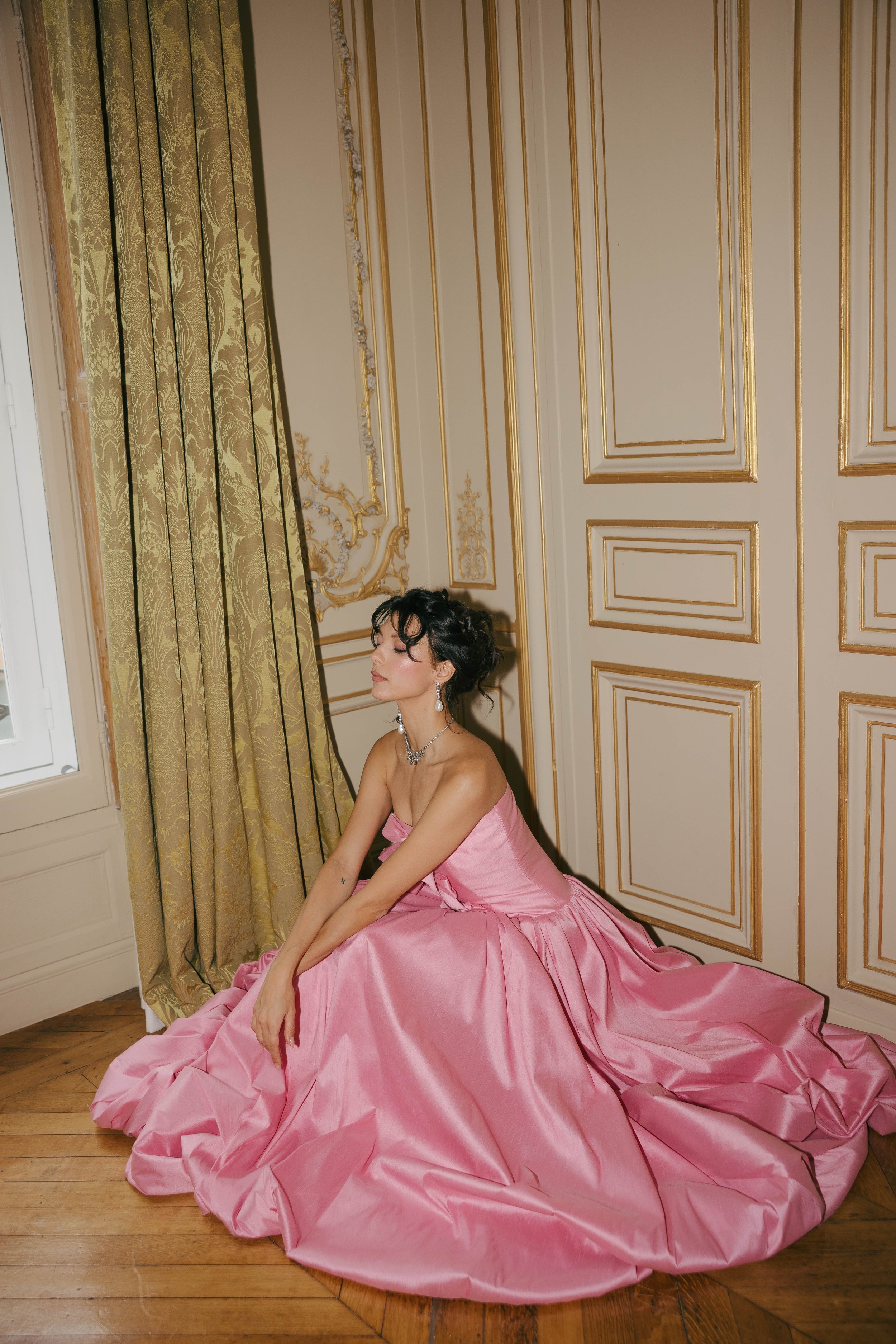 The & For Love Bridal Antoinette gown is a bold fashion-forward statement piece designed for the bride who wants to turn heads. With its striking silhouette, edgy couture details, and expertly crafted structure, this gown blends high-fashion attitude