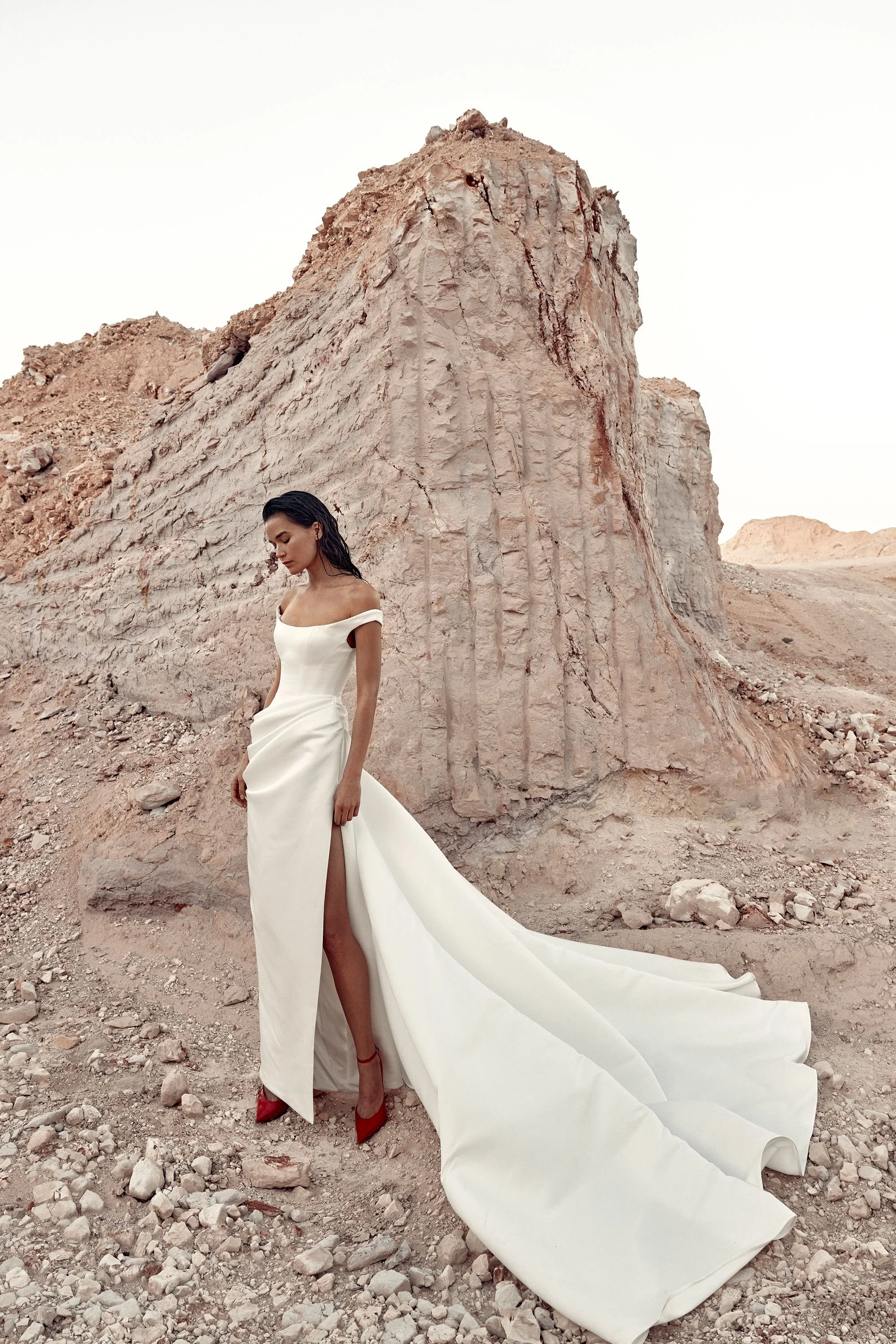 KYHA Bride Winton Gown is a modern bridal statement defined by clean lines and confident structure. featuring a sleek silhouette that skims the body, the Winton balances minimalist design with considered detailing for a refined, fashion-forward look.