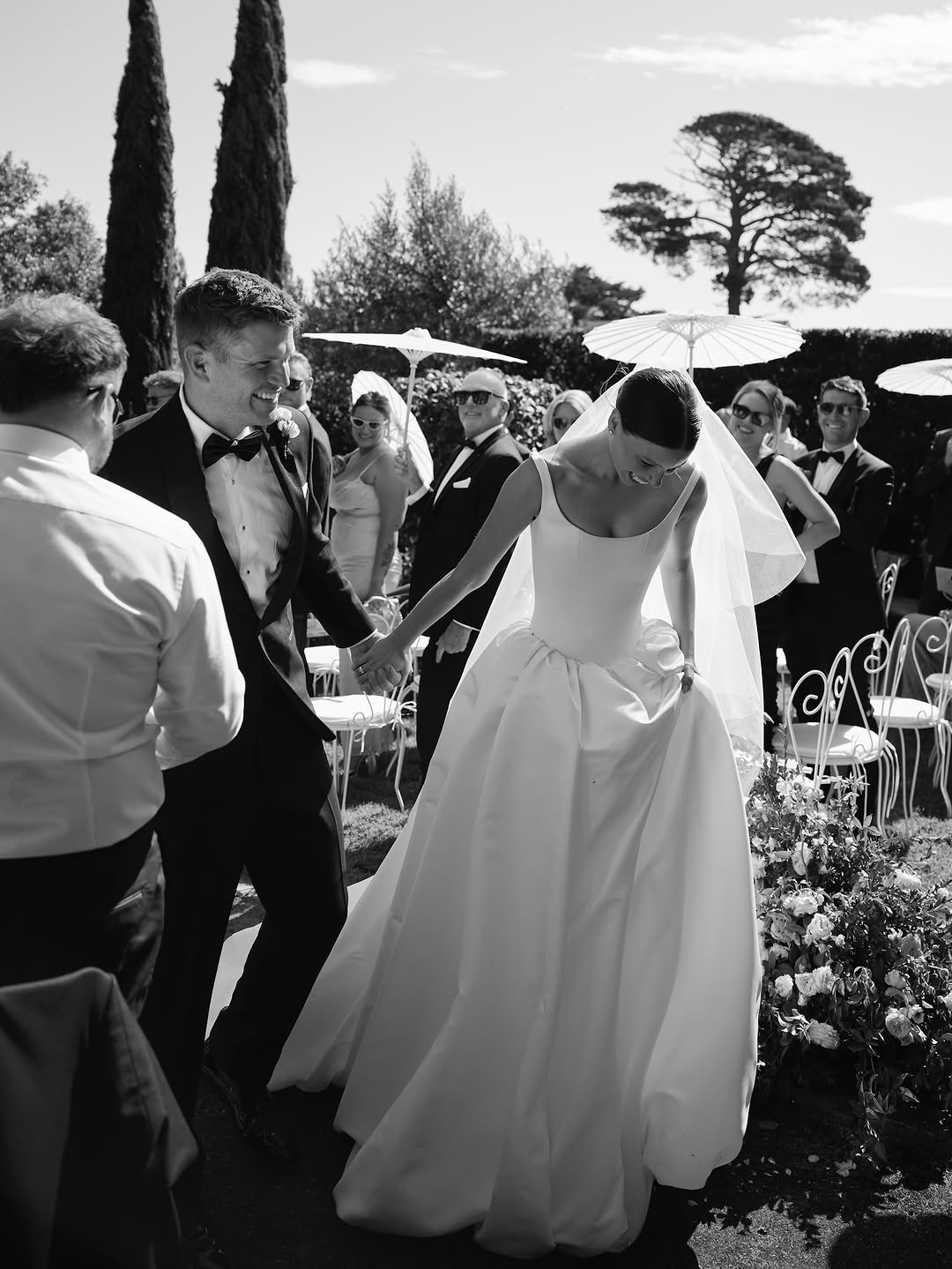 You’re a powerful presence in KYHA Bride Emery. A fresh take of a timeless silhouette, Emery balances sculpted precision with cloud-like airiness. A scoop-neck, corseted bodice flows into a gathered skirt, embodying KYHA’s signature play on structure