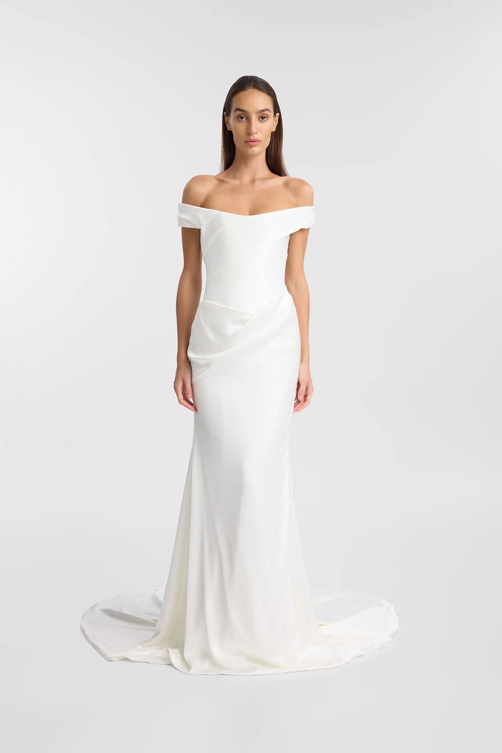 Irreverent glamour takes the spotlight in KYHA Bride Nia. Cut from sleek double satin, Nia features a highly structured bodice with a tight drape and a fit-and-flare skirt cut to accentuate the silhouette. The draping graciously falls into a floor-sw