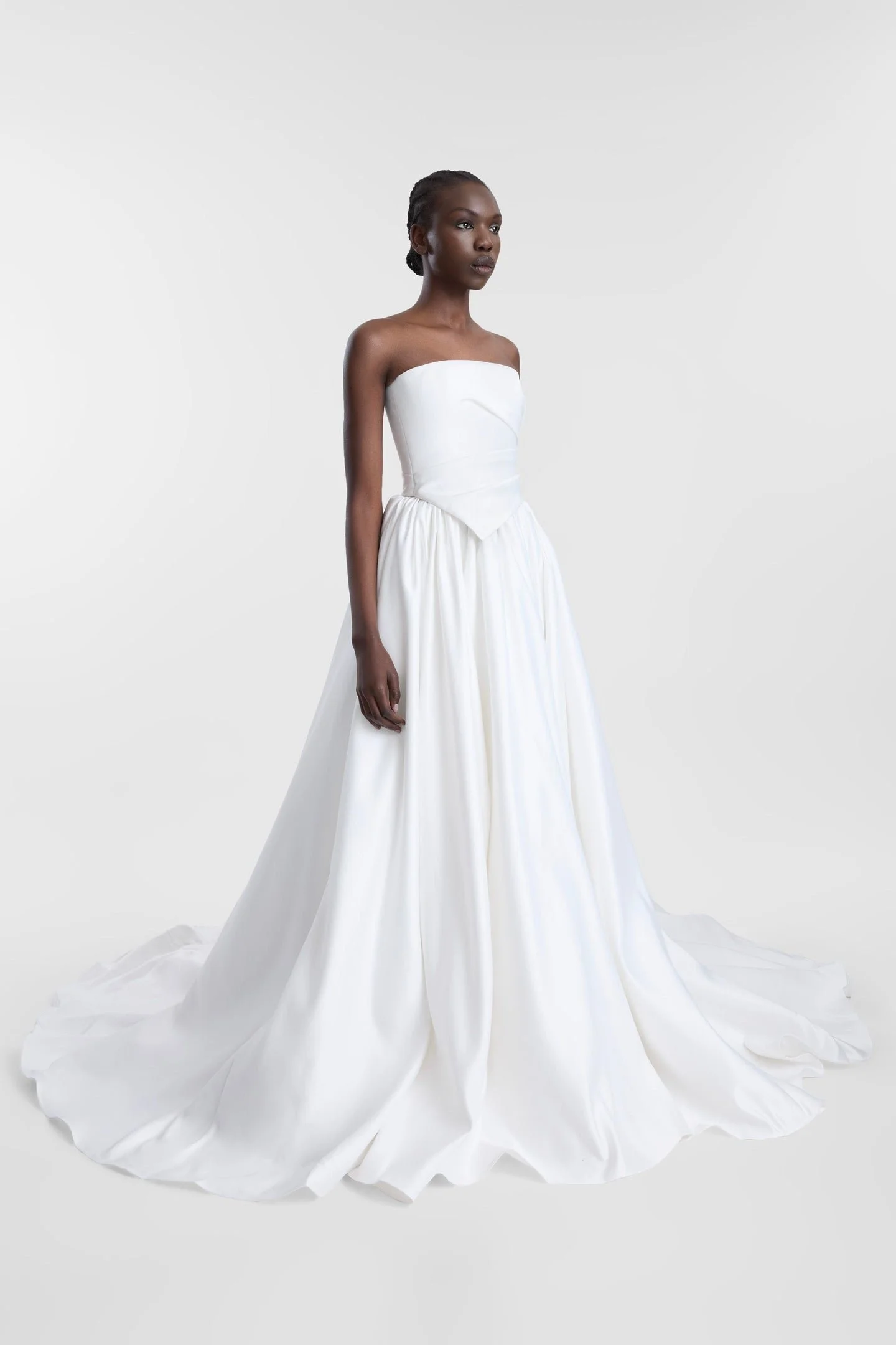 The way to win bridal style is in two parts, first via Vara. Spirit of the 70s captured via its scarf-detailed hem, Vara is a structured corset crafted from luxe duchess satin. Cut for a close fit, Vara features a modern straight neckline and soft or