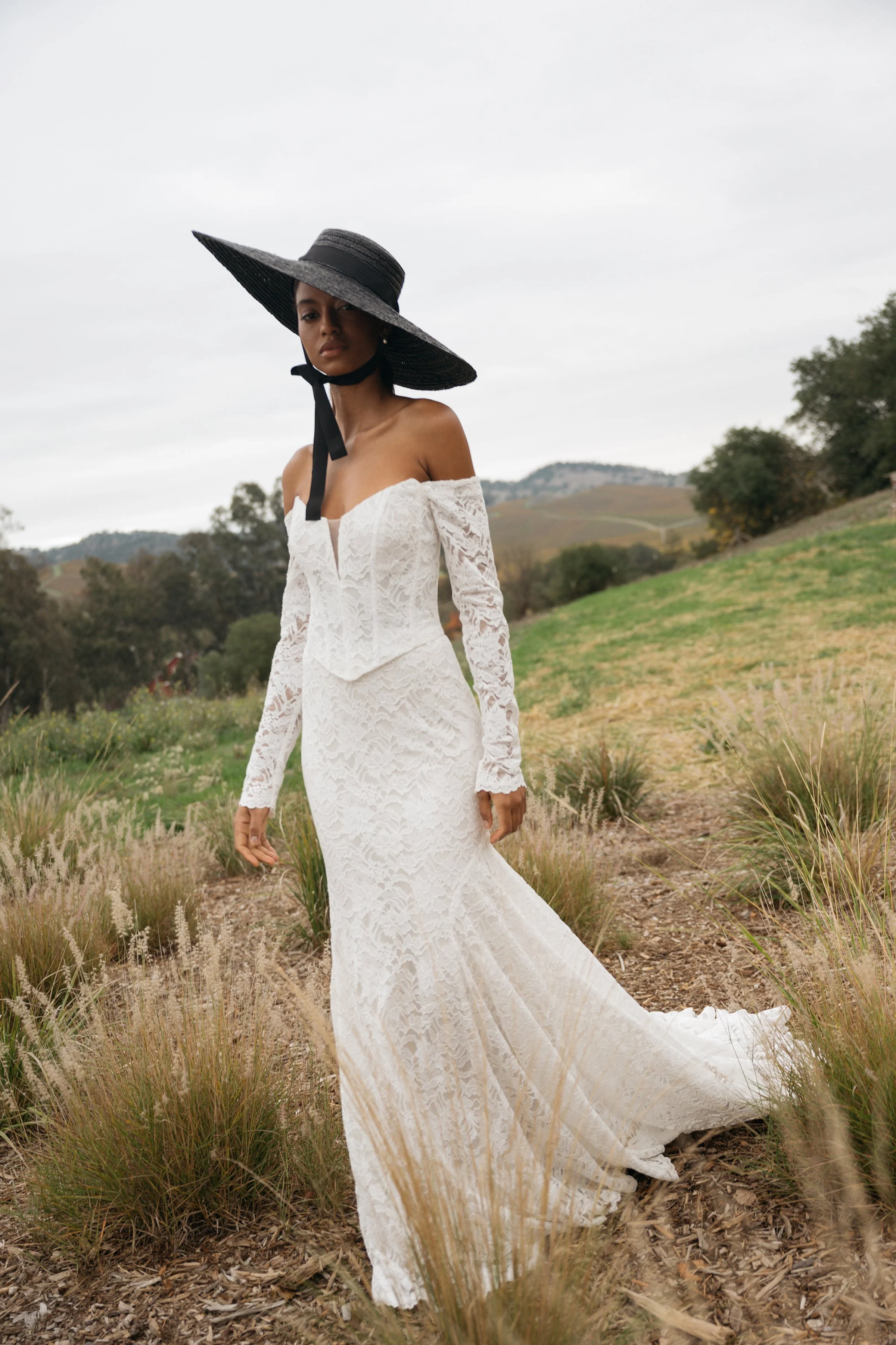 Jenny Yoo Bridal Natalie: The Natalie gown, cut in our beautifully detailed Finley lace, adds a romantic flare to an otherwise modern and sultry silhouette.