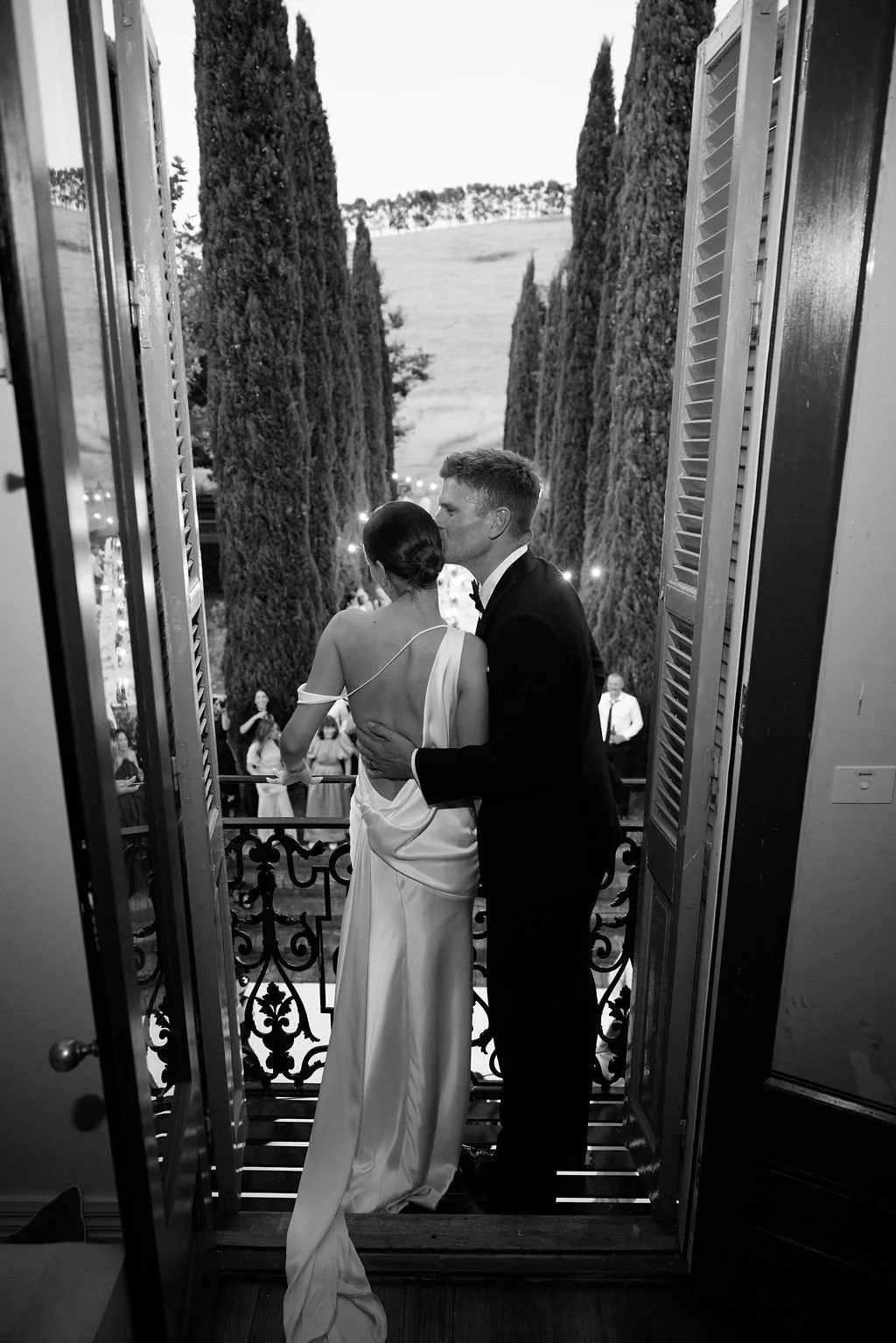 Effortlessness takes the lead in KYHA Bride Arlo. Cut on the bias, liquid double satin falls naturally over the body, delivering nonchalant energy with a distinctly modern edge. A clean, minimal off-shoulder front allows the open back to take centre 