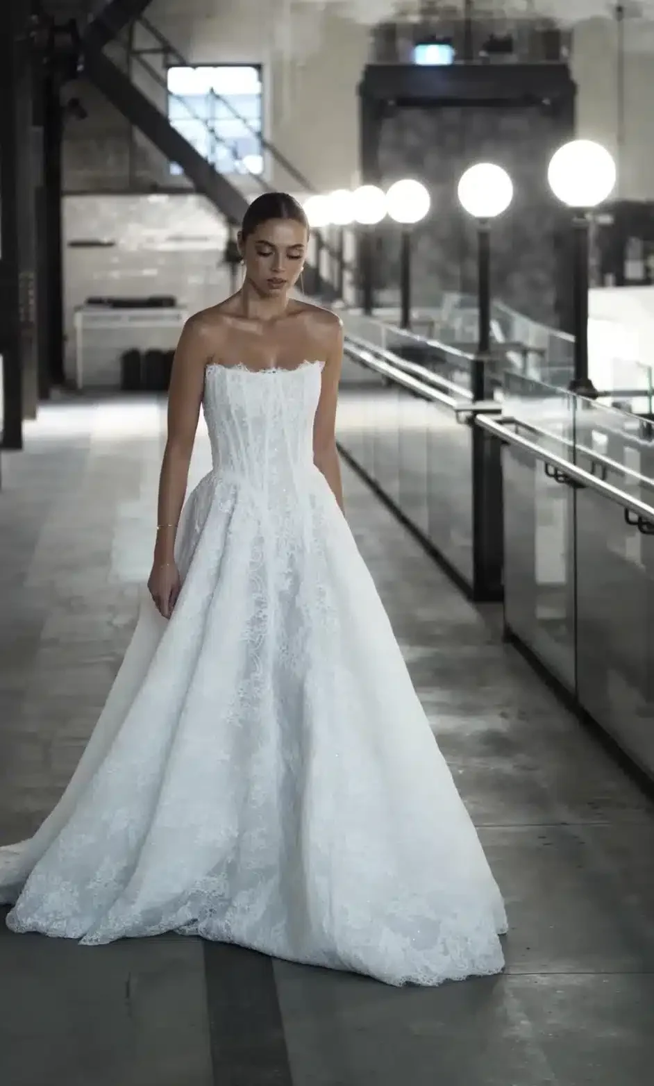 Dahlia in Chantilly Lace is the enchanting sister to our iconic Mikado Dahlia. This lace dream ball gown offers two variations: with a sparkling underlayer to shimmer under candlelight on the dance floor or a sequin-free design that lets the intricat