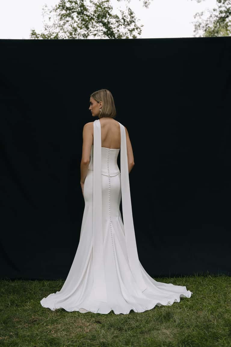 Jenny Yoo Bridal Alora Gown. Sleek, chic, timeless, the Alora gown is a show stopper. Alora is in stock at Halo and Wren.