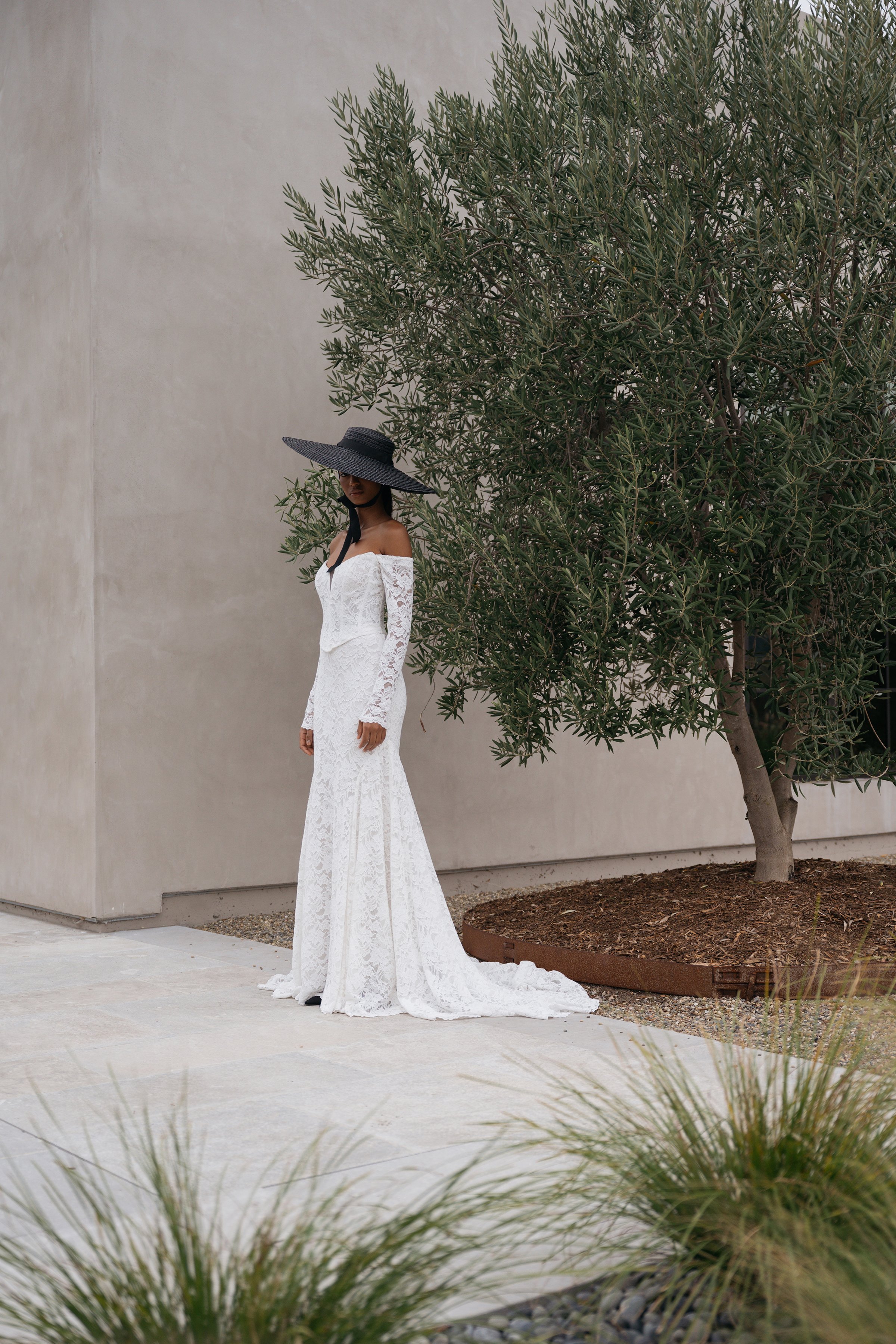 Jenny Yoo Bridal Natalie: The Natalie gown, cut in our beautifully detailed Finley lace, adds a romantic flare to an otherwise modern and sultry silhouette.