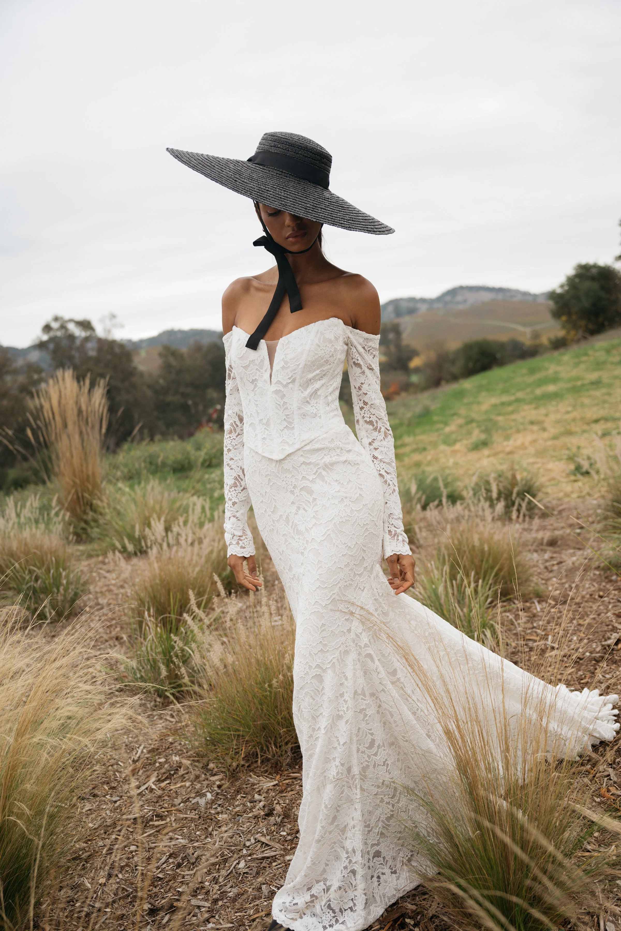 Jenny Yoo Bridal Natalie: The Natalie gown, cut in our beautifully detailed Finley lace, adds a romantic flare to an otherwise modern and sultry silhouette.