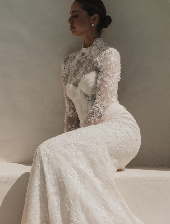 Alena Leena Bridal Rubinette available at Halo & Wren Bridal

The Rubinette gown is demurely flirtatious with a hint of seduction. A structured bustier is softened by swathes of lace, and hints of sparkle shine as you move.

Perfect for the bride loo