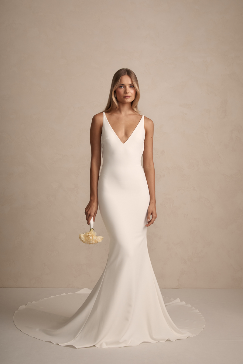 Archie is MWL's most iconic design for a reason. Her effortlessly timeless front pattern and signature French crepe material contrasts beautifully with her perfectly draped cowl back and button detailing