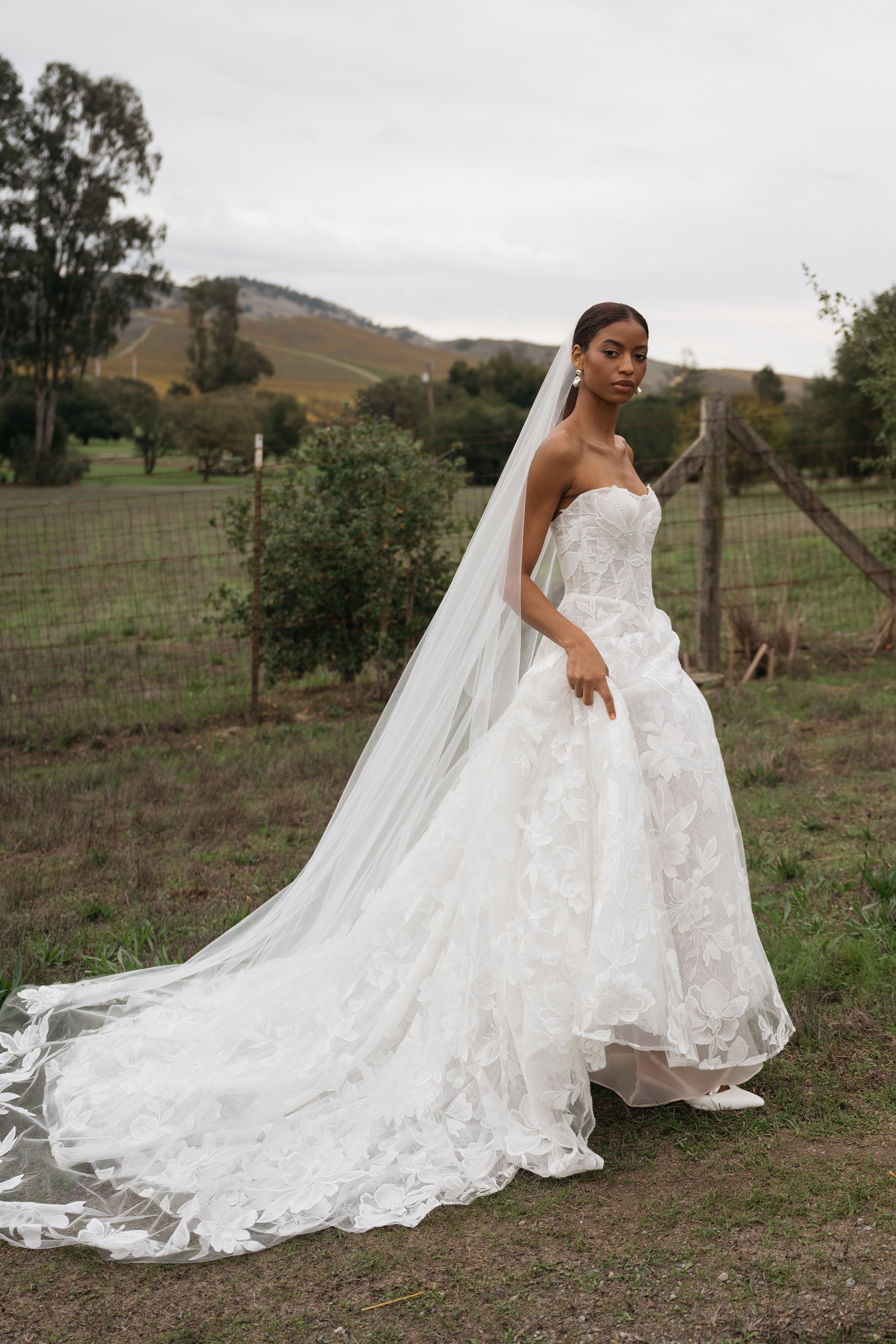 Jenny Yoo Bridal 'Gwendolyn' gown. Airy and romantic, with a beautifully structured corset bodice, the Gwendolyn gown is a feminine dream.