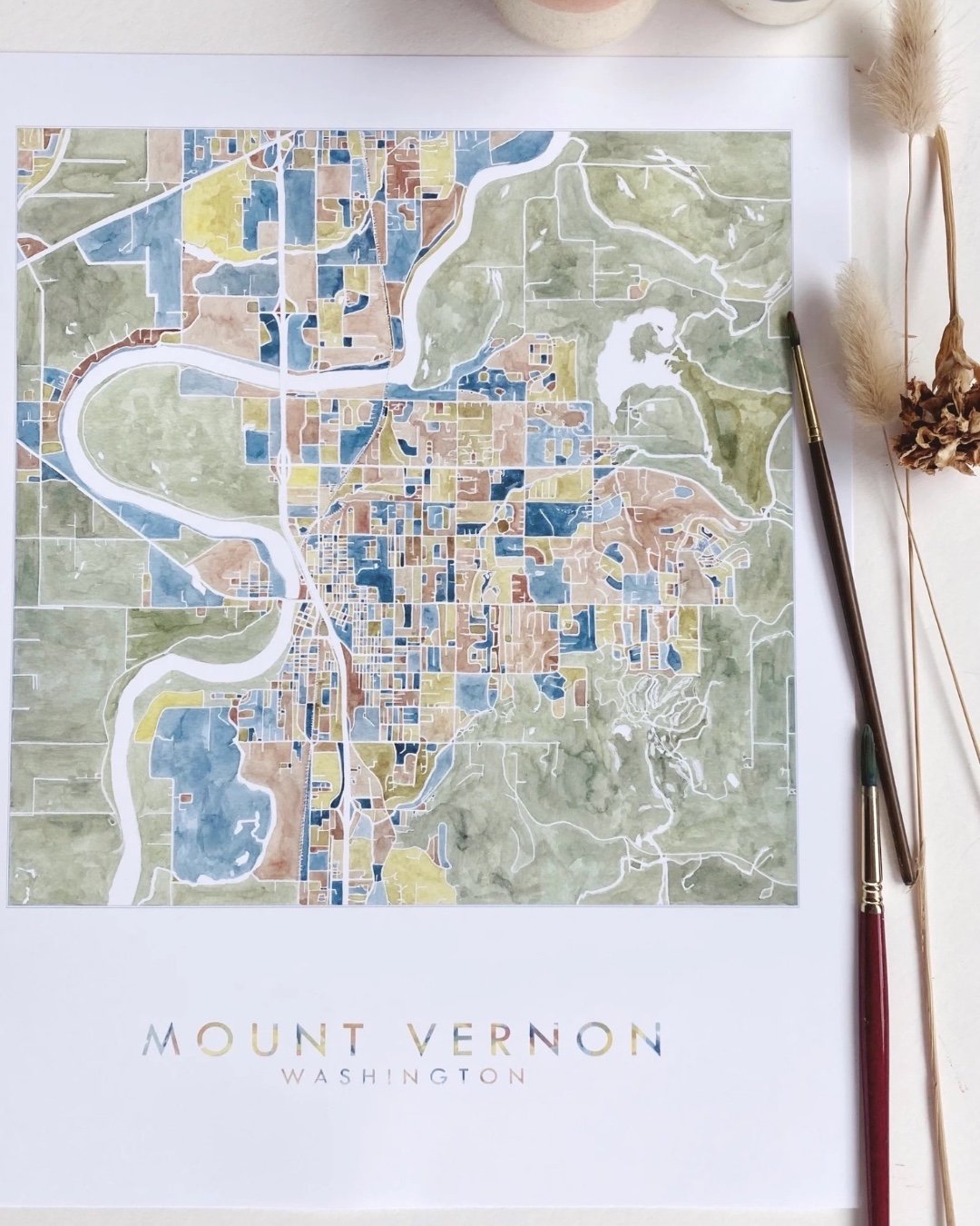 @turnofthecenturies&rsquo; watercolor map designs pay homage to the places we love. Whether your heart is in Mount Vernon, Bellingham, Seattle, or out of the state completely, artist Kirsten Sparenborg has a collection of originals and prints inspire