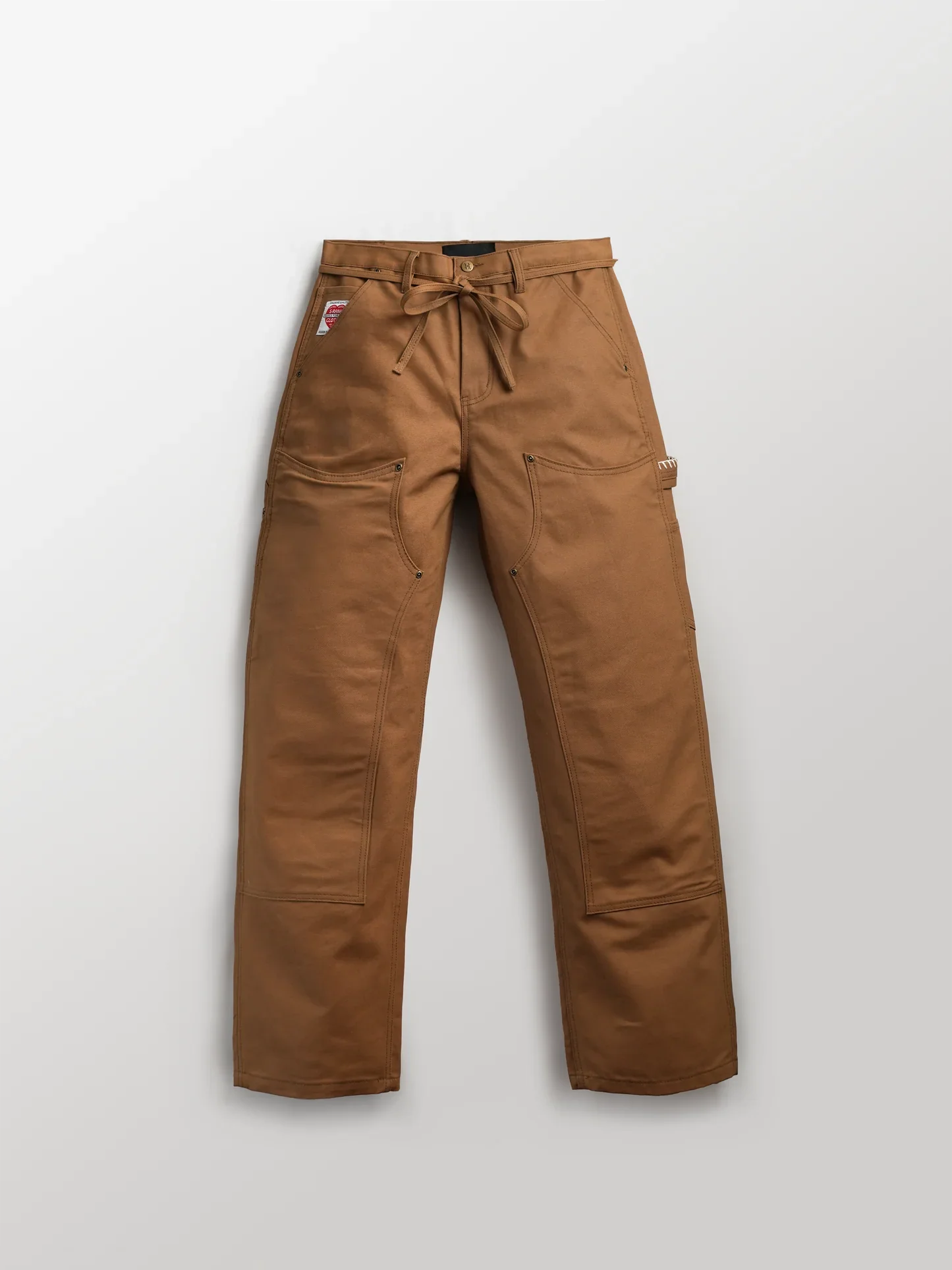 Work Pants: by our friends at Hidden Characters.
Double knee carpenter pants in duck canvas
colorway inspired by our Miso Ramen. Heavy-weight & stiff-- made to break in designed with big compartments and pockets. 
$169
