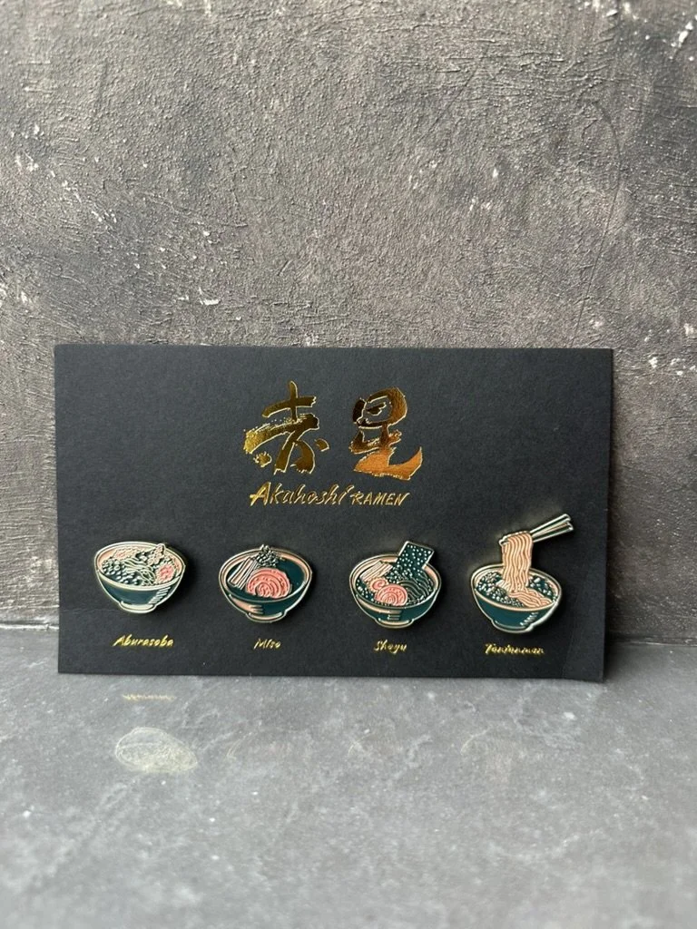 Pins showing our ramen lineup. Choose from Miso, Shoyu, Tantanmen, or Aburasoba
Single Pin: $6 / Set of 4: $20
