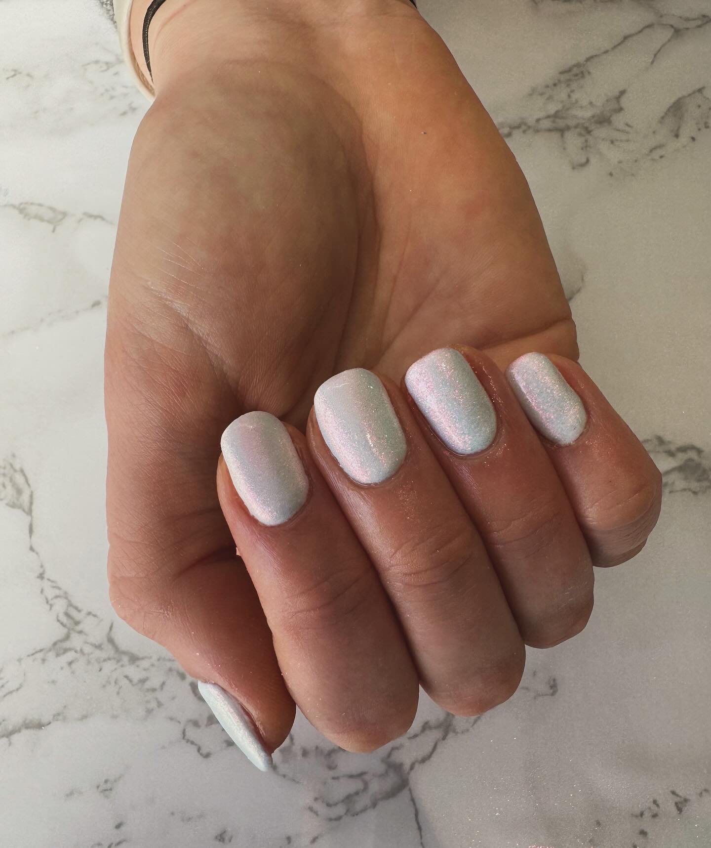 In love with this set 🥰 

Builder in a Bottle Infills for my lovely client today, still leaving the strength but shortening the length of her natural nails. We did a white polish using Alpine Snow ~ OPI, finishing with Magpie ~ Pandora Chrome dust t