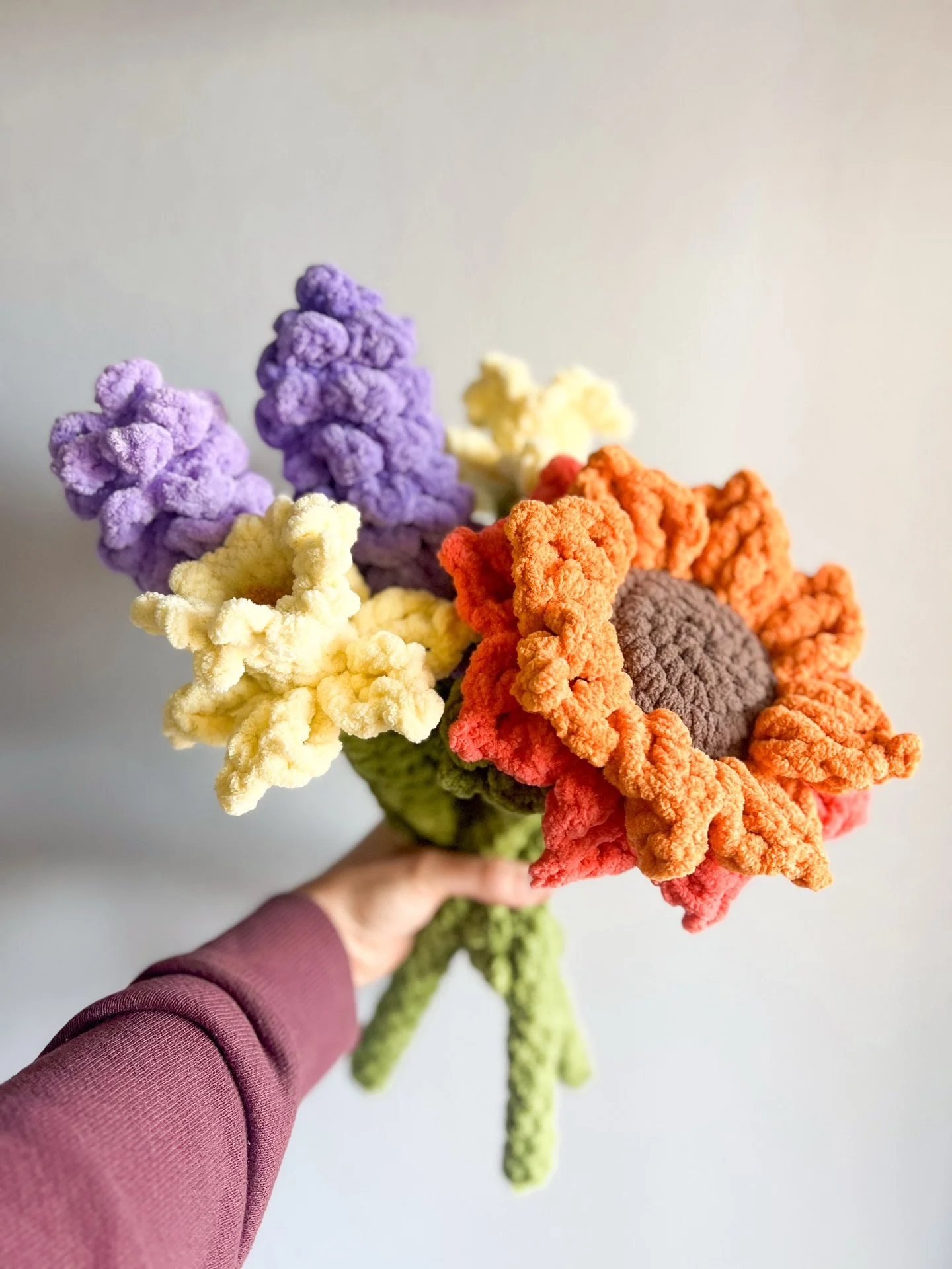 Fresh blooms ready for market. 💐💛

Flower patterns in my Etsy shop >> sunflower, lavender, and daffodils. 
Yarn >> @yarnspirations Bernat Blanket &amp; @premieryarns Basix Chenille Brights (bright orange sunflower petals) 

#crochetmark
