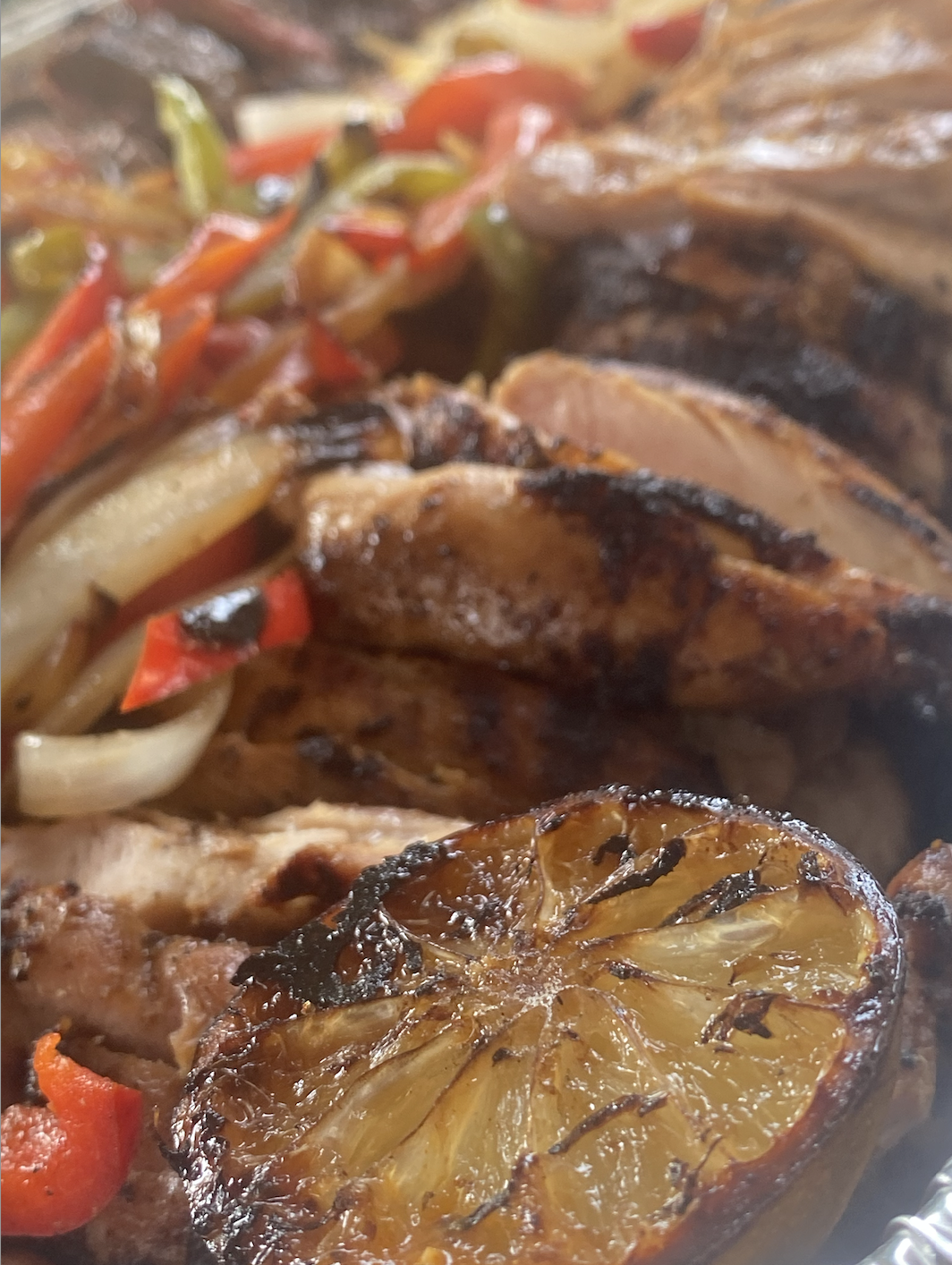 Chicken fajitas with roasted lime at a Houston catered event.