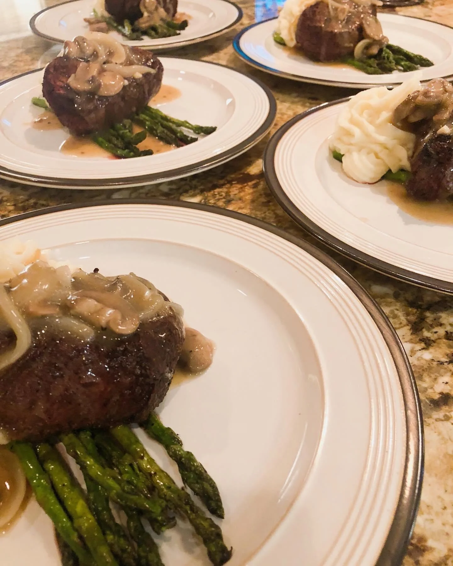 Smothered pork tenderloin at a privately catered event in Houston.