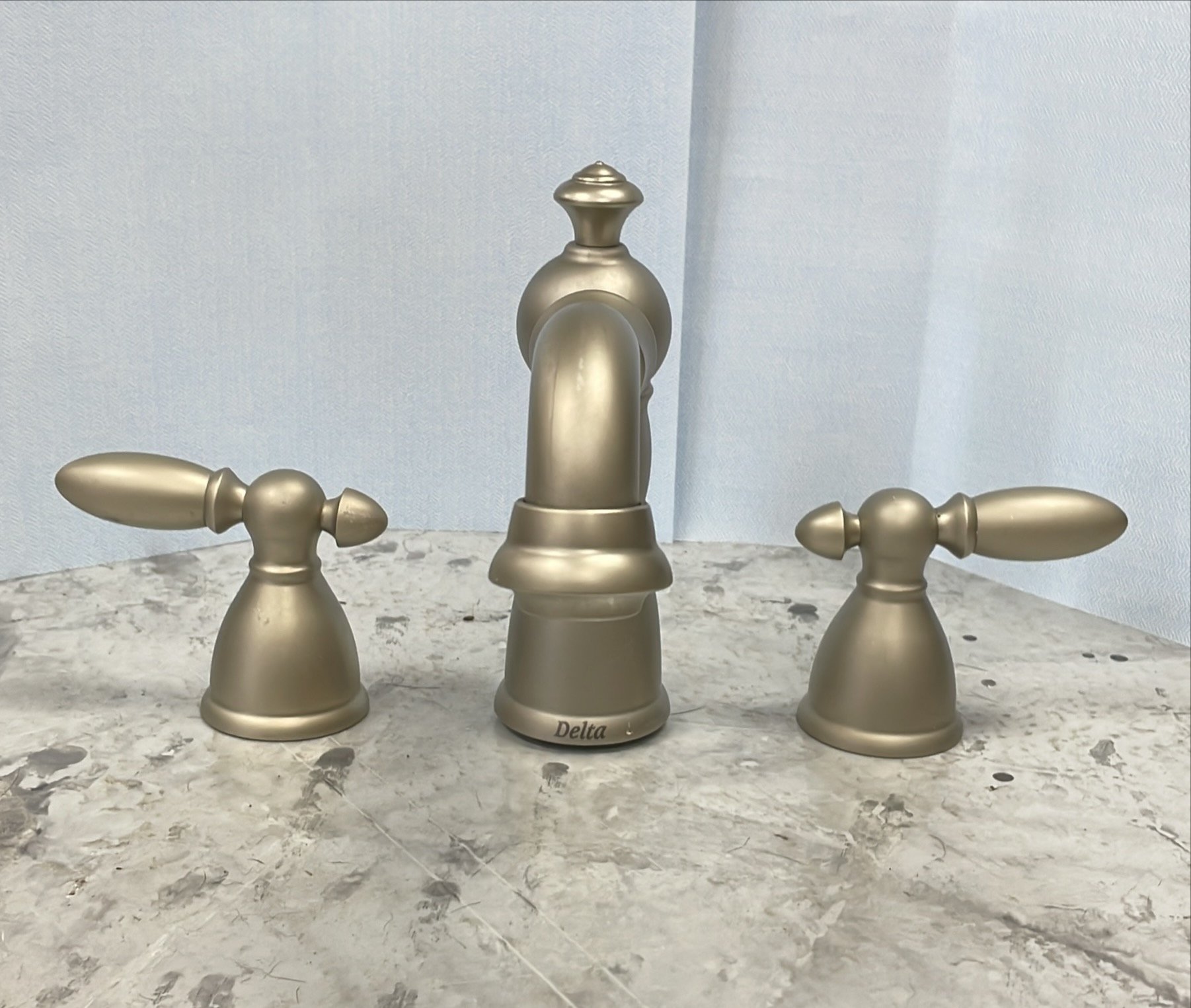1 solid matte delta faucet with knobs.jpg