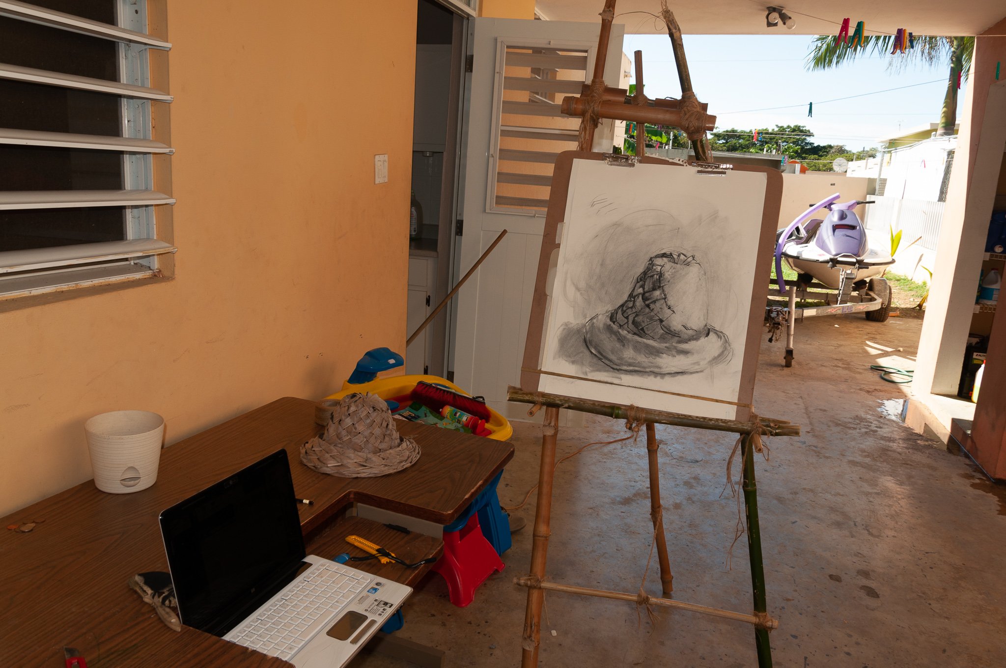 home made easle, charcoal drawing in prog.