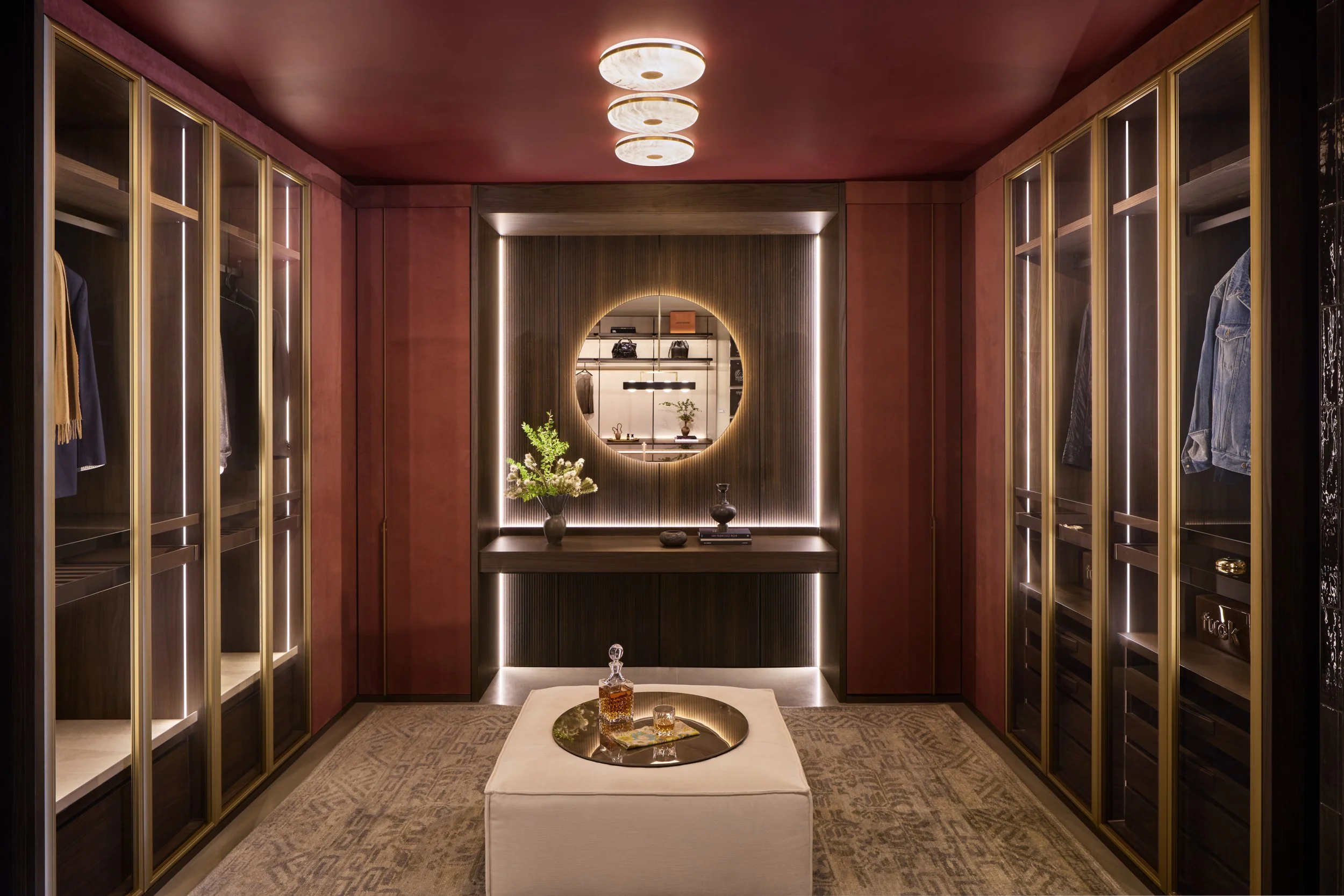 Night Collection corner wardrobes in Raisin Alcantara with Boisserie back wall, integrated LED lighting and backlit mirror — SCIC San Francisco showroom