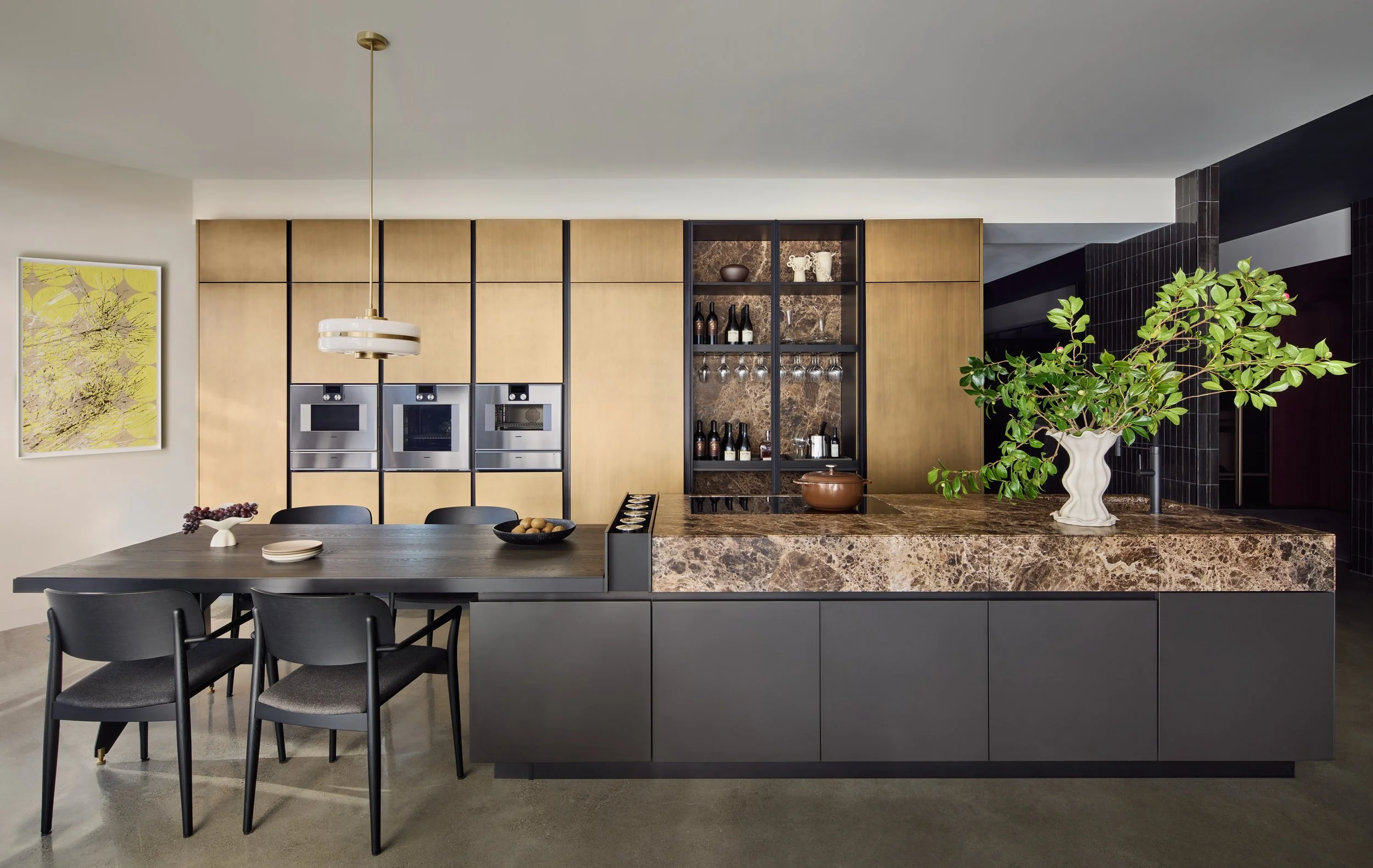 Custom Italian kitchen with brass cabinetry and marble island — SCIC San Francisco showroom