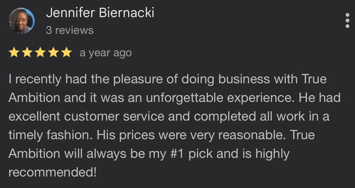 A Google review by Jennifer Biernacki praising True Ambition for excellent service, reasonable prices, and a positive experience.