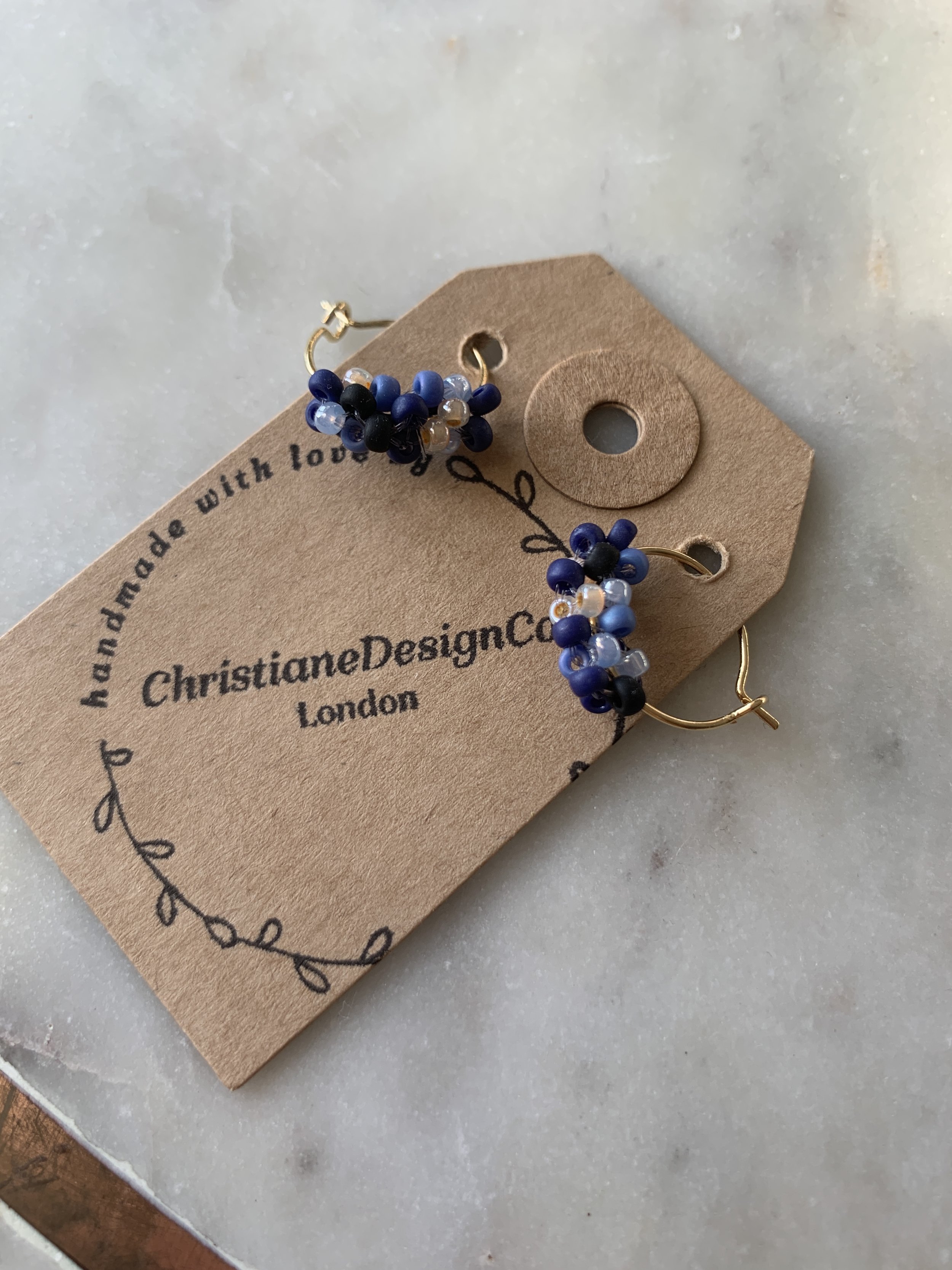 Mixed blue mini gold hoops