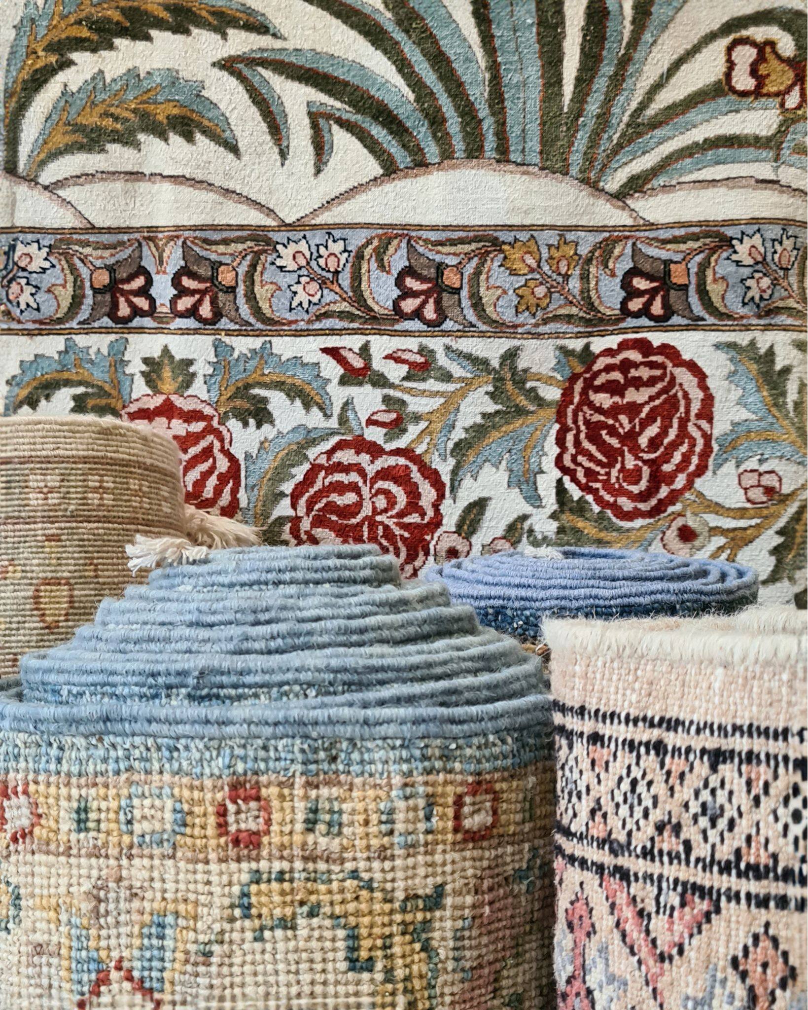 Unroll a world of colour and craftsmanship, where every rug tells a story woven through time.

From the plush blues and warm reds to the delicate ivories, our collection is a tribute to the artistry that has been adorning homes for centuries.

Visit 