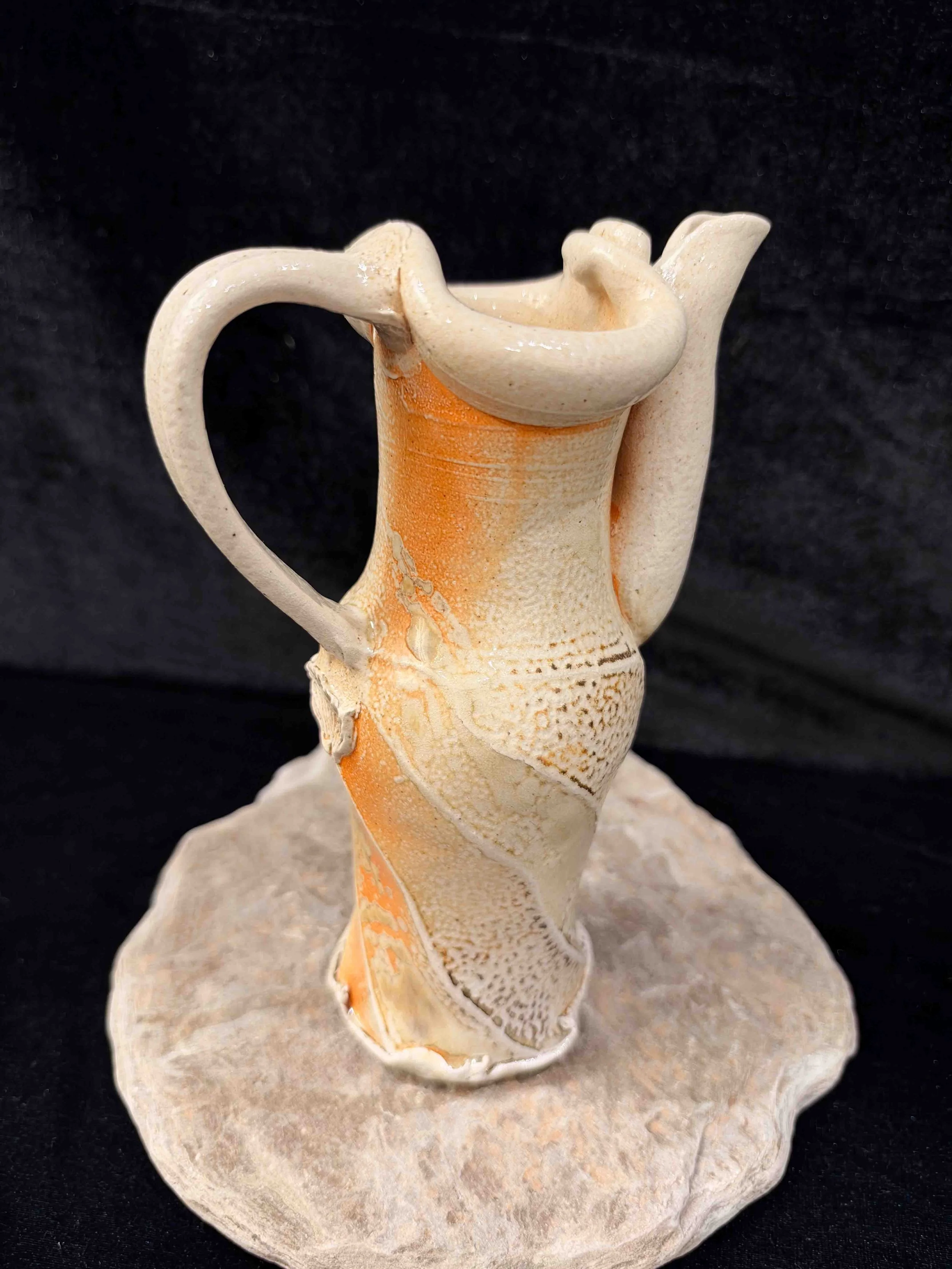 Ruthanne Tudball - soda glazed faceted jug - side view.jpg