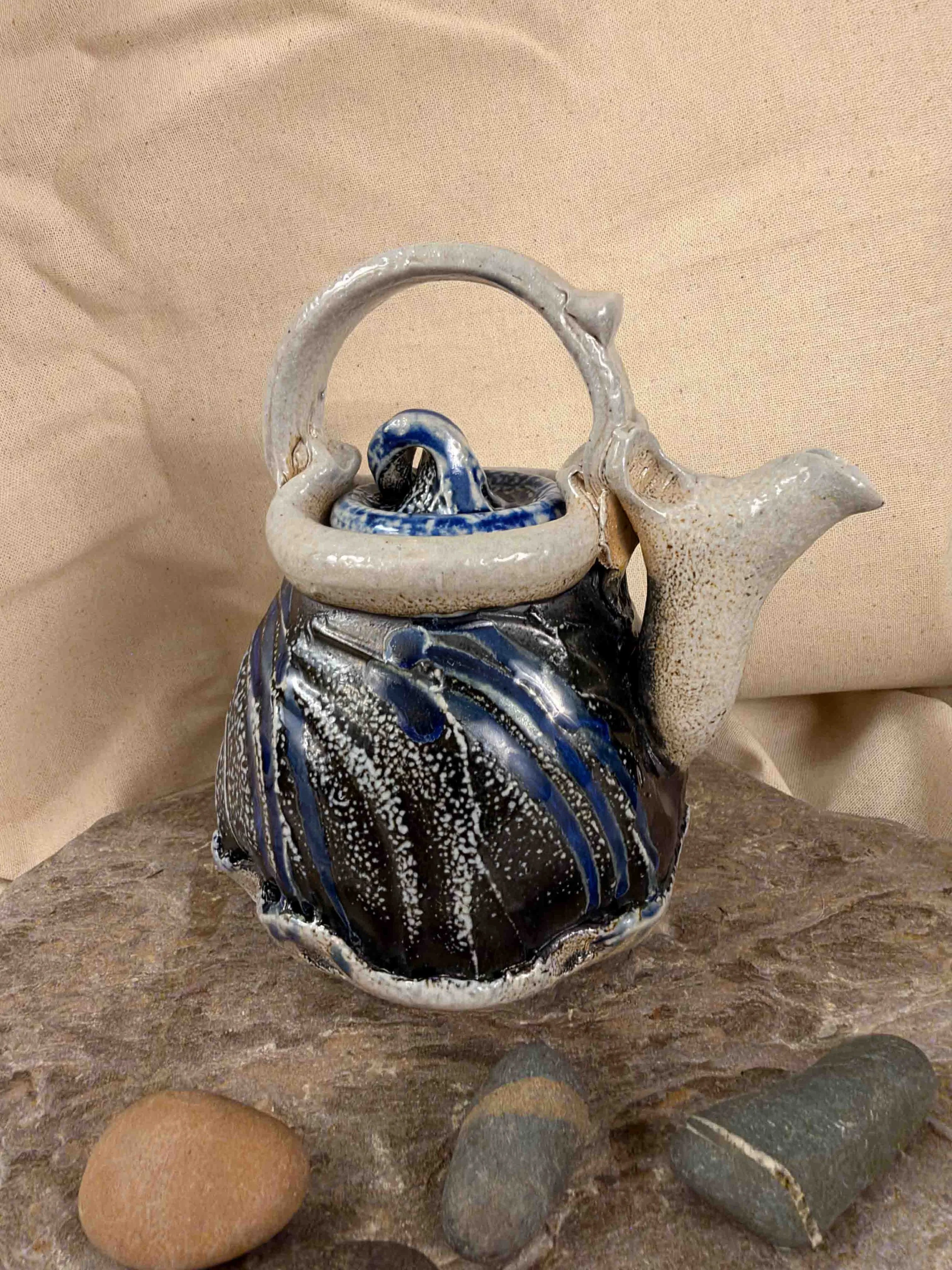 Ruthanne Tudball - Soda glazed teapot on tripod feet