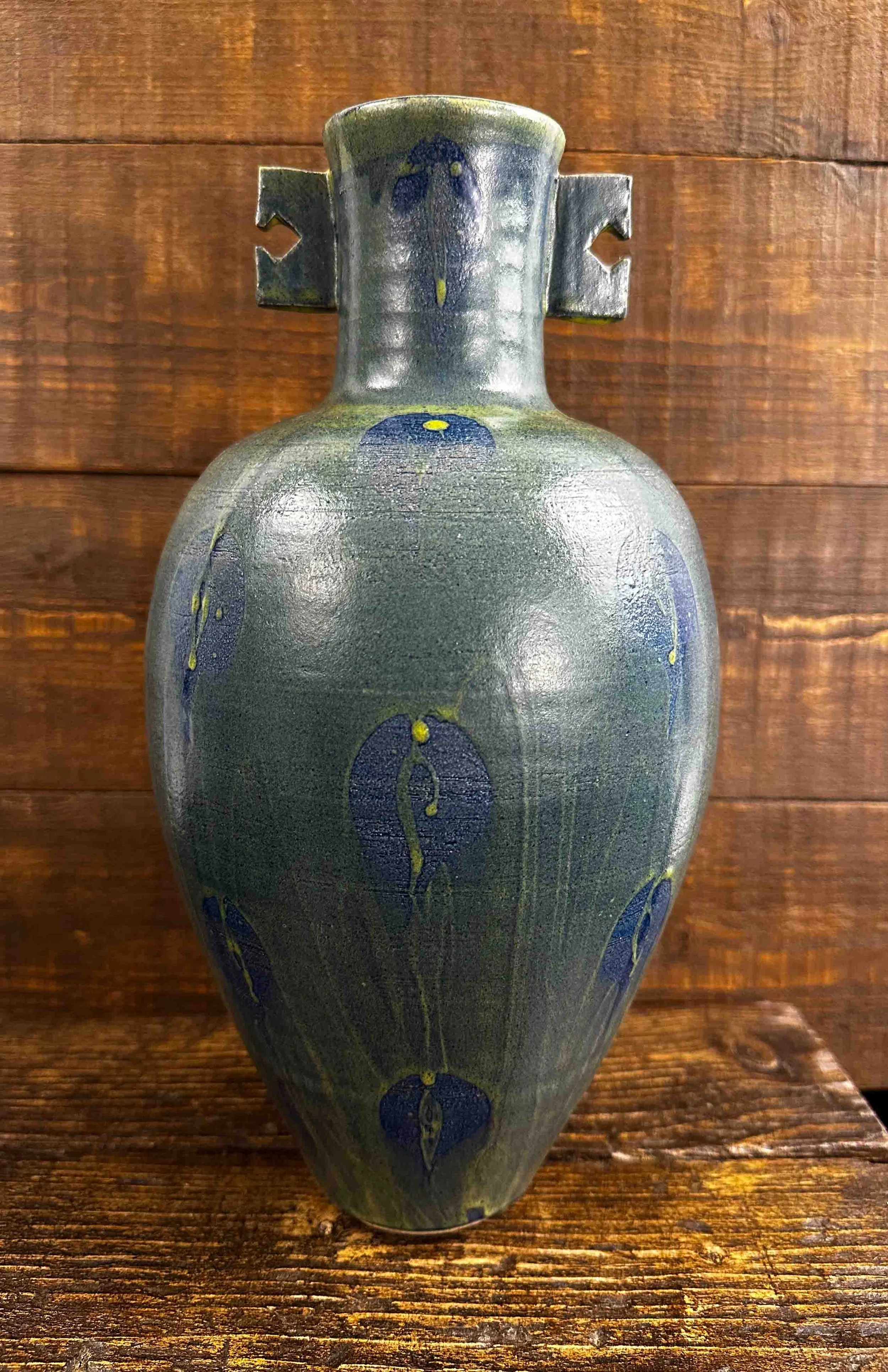 1112/224 - Alan Brough - Large Iris design vase with narrow neck with keys