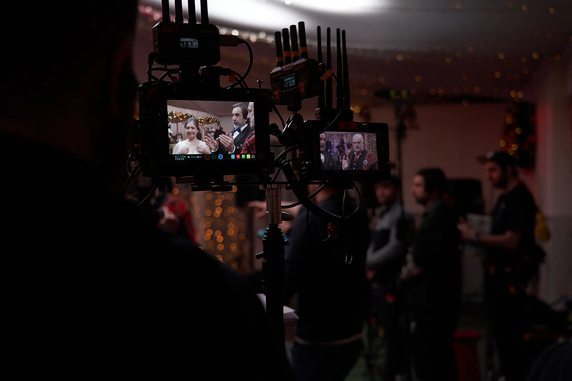 video monitors on the set of a feature film