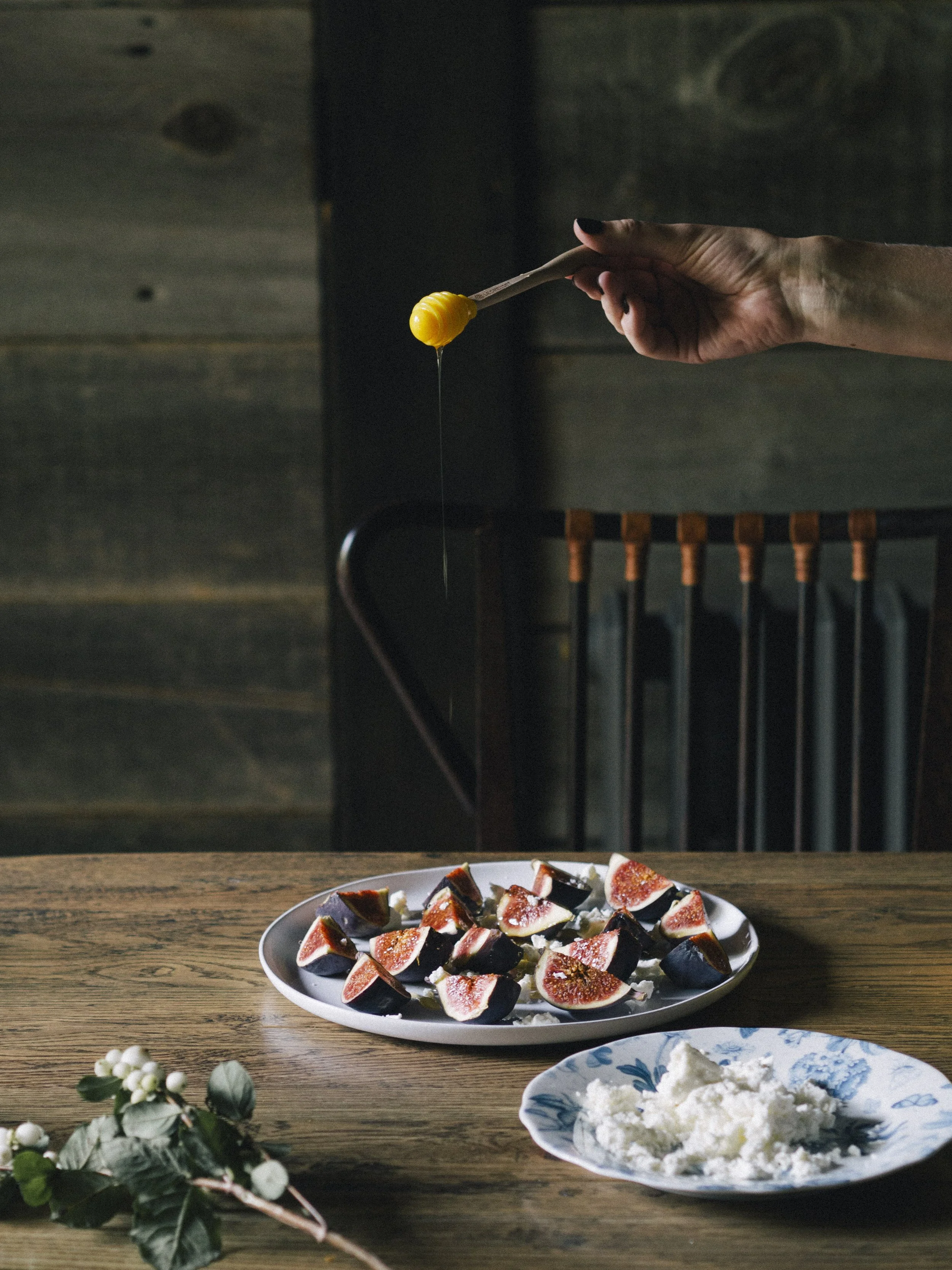 honey drizzled over feta and fresh figs