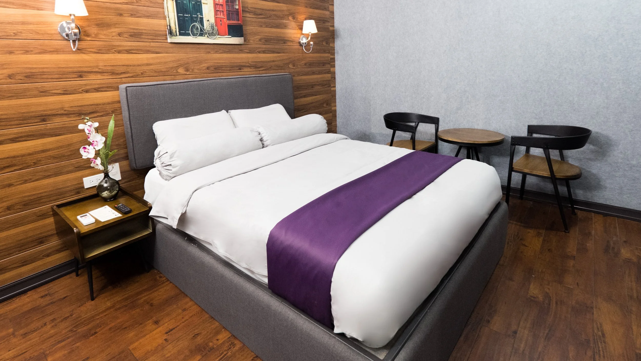 Queen room with large bed at Axiaa Hotel Quezon City