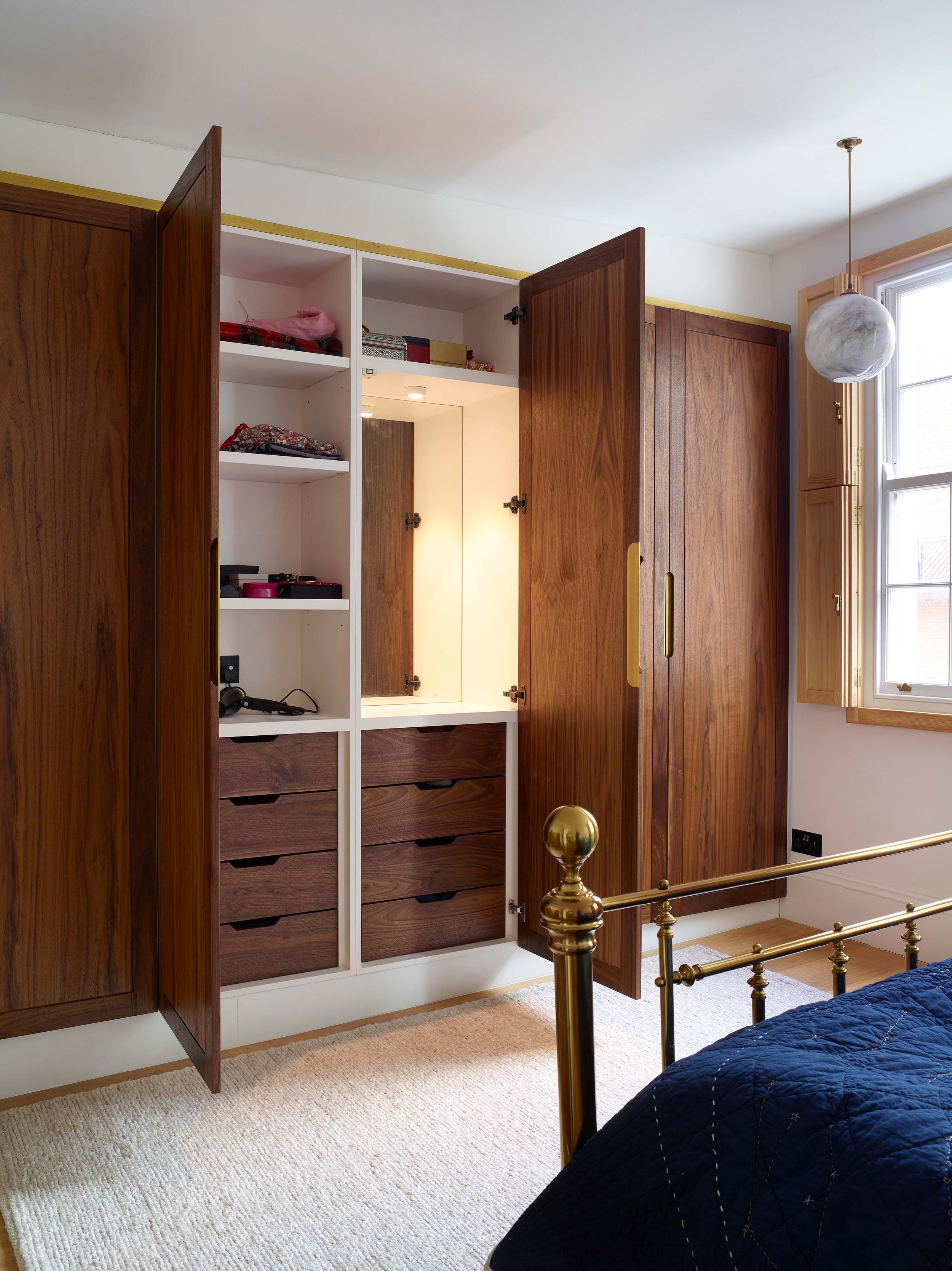 a_small_studio_writer_bedroom_cupboard_timber.jpg