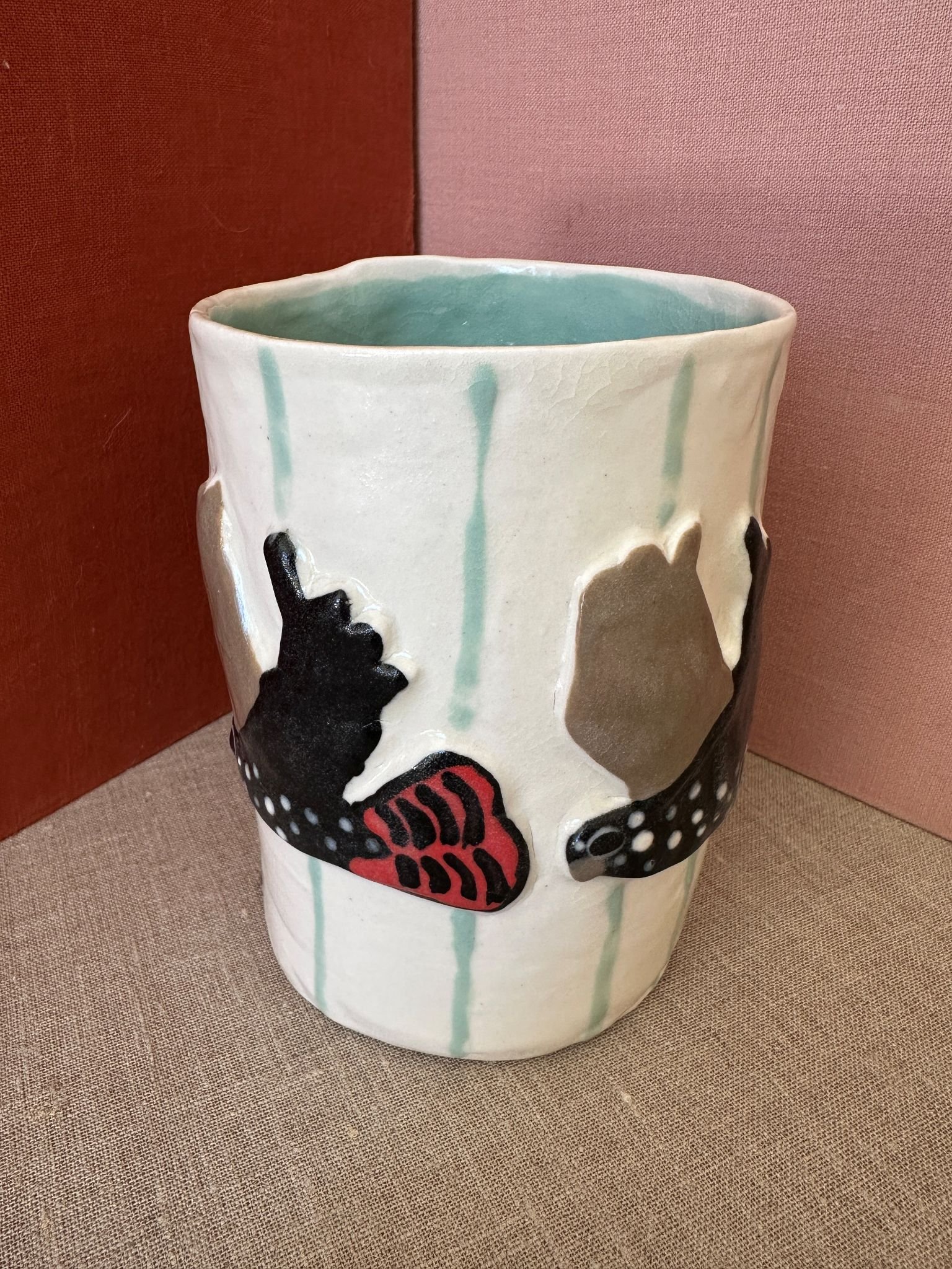 Hannah Goggs Red Tail White Vase Green Stripe .jpg