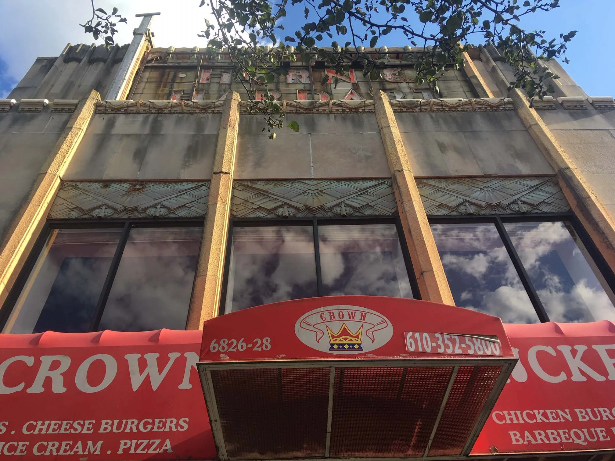 A Crown Fried Chicken taking over an old Horn & Hardart Automat building, Philadelphia, 2019