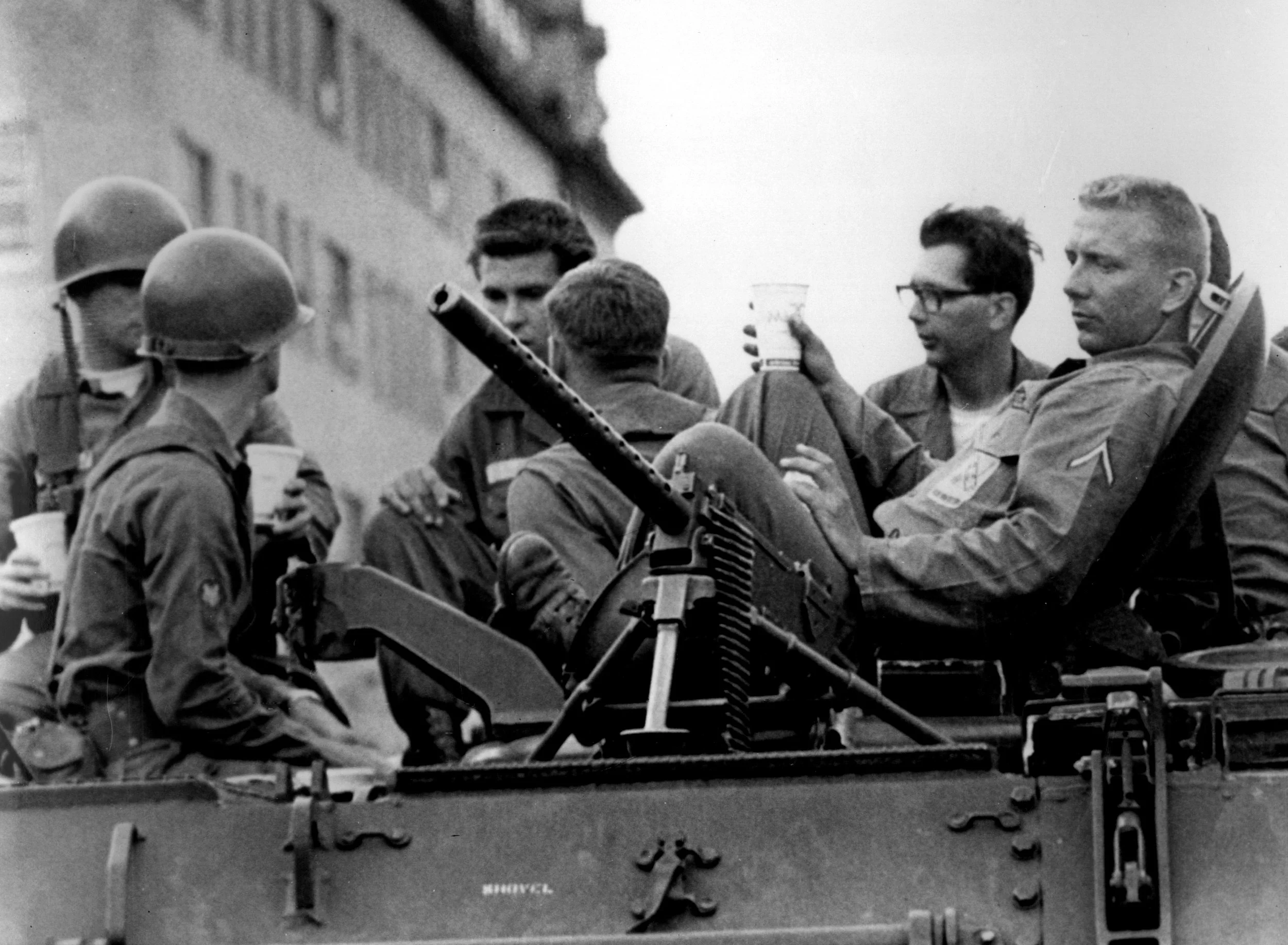 Troups patrolling in Hough. The Cleveland Press Collection, Michael Schwartz Library at Cleveland State University