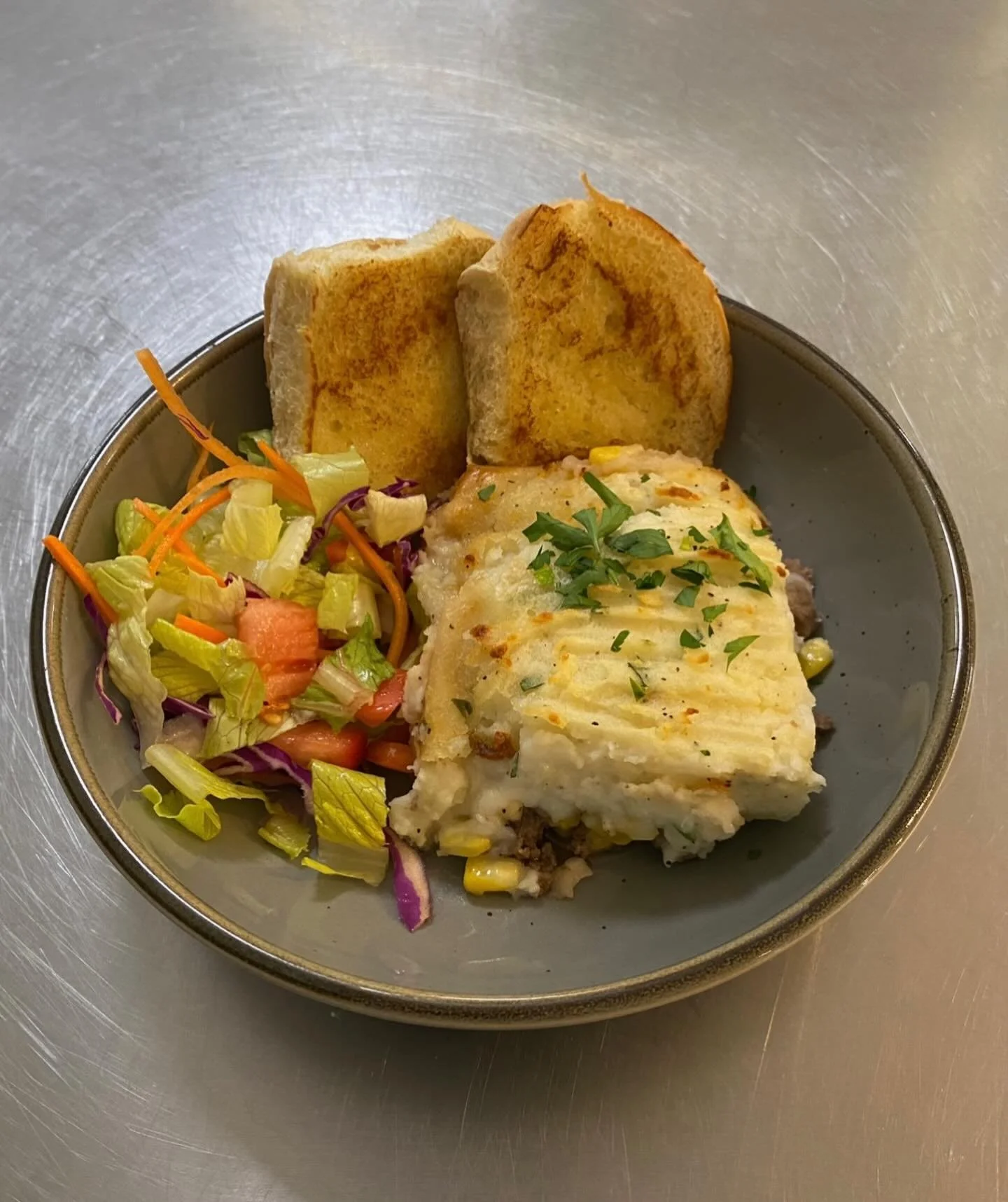 Wednesday Night Special!! 
Cottage Pie - ($15)
(a.k.a. Sheperd&rsquo;s Pie)
Served with side salad &amp; Roll
Ground Beef, Ground Pork, Onion, Garlic, Thyme, Corn, Parsley, Potatoes, Cream Cheese, Butter, Half -n- Half, Salt and Pepper.) #tunbridge #