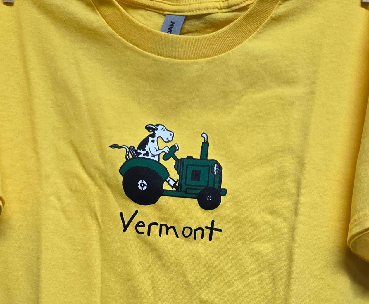 Tshirt_ Youth_ Vermont Cow on Tractor - Edited.jpg