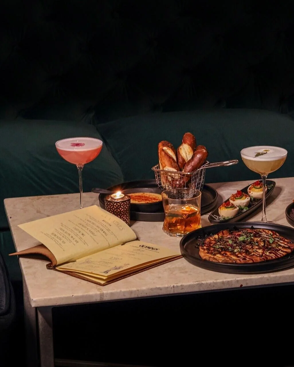 We&rsquo;ve been busy behind the bar and in the kitchen... shakin&rsquo;, stirring, and taste-testing our way to a fresh lineup of cocktails and bites at VOO Lounge.

Now it&rsquo;s your turn.

Stop by this weekend to sip something new, catch some li