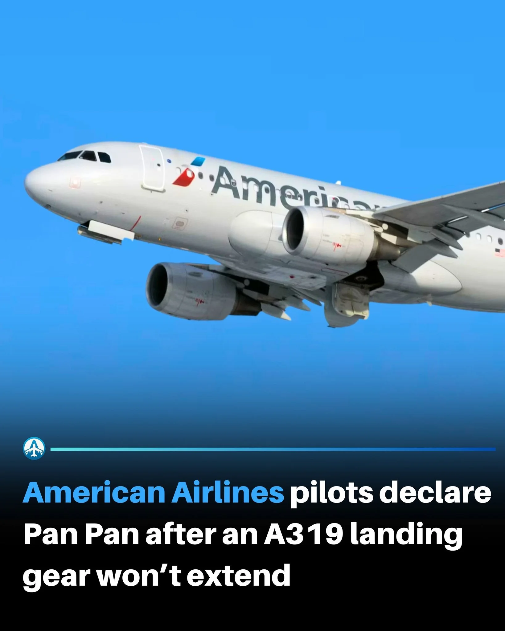 An American Airlines plane flying in the sky.