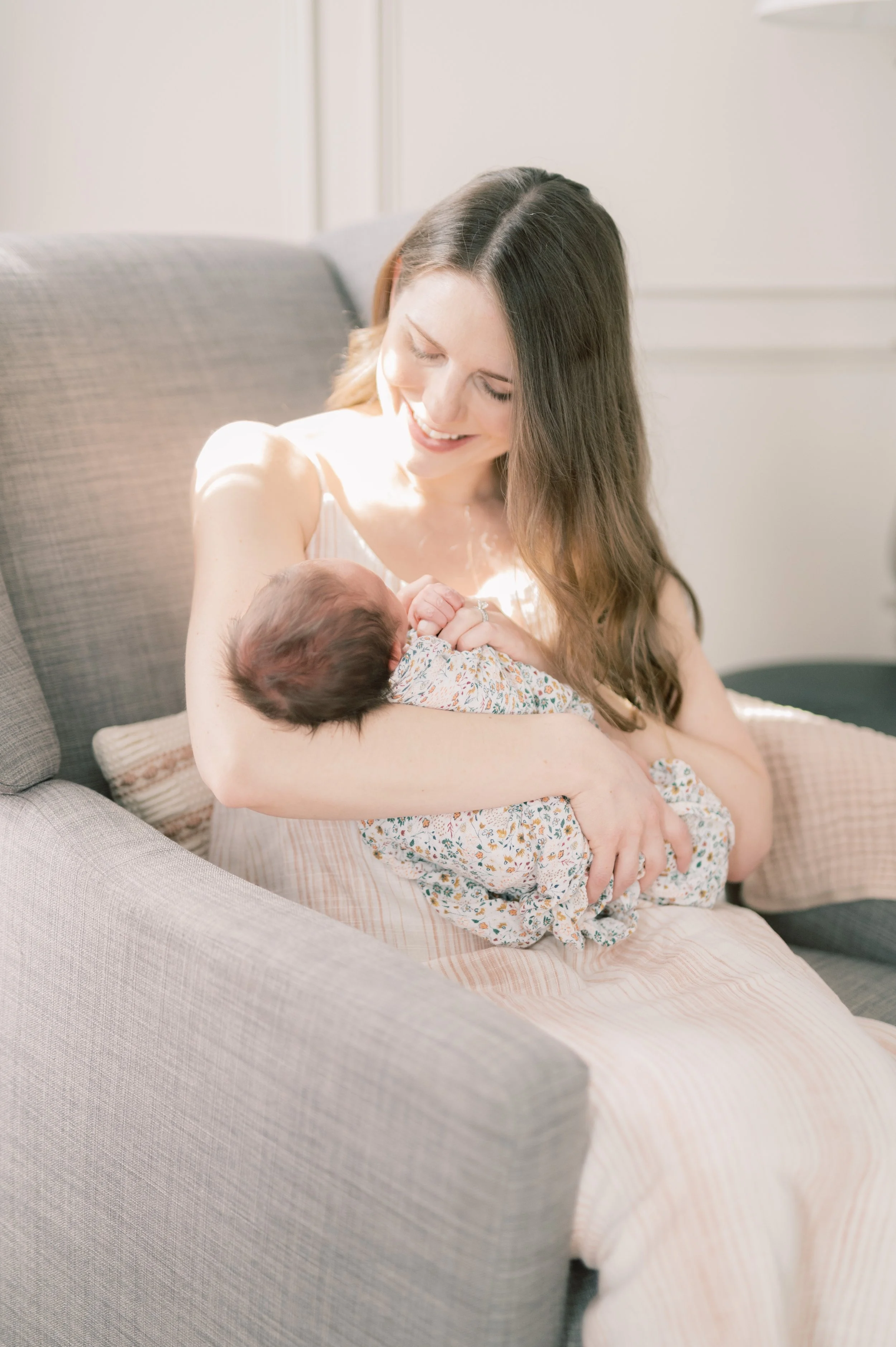 big sister smitten over baby brother