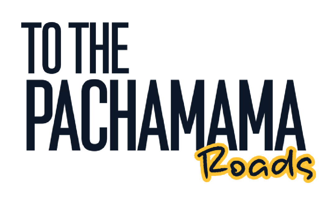 Text graphic reading 'To The Pachamama Roads' with 'Pachamama' in large navy letters and 'Roads' in yellow, handwritten style.