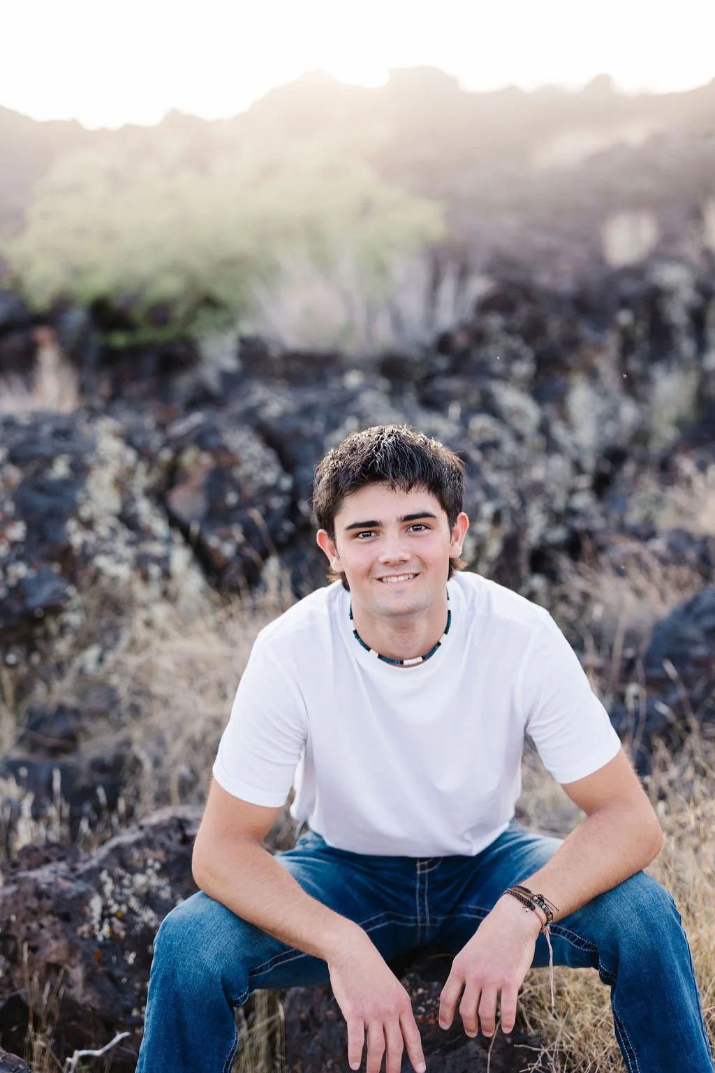 High school senior photography capturing a relaxed, natural portrait against the unique desert landscapes of Southern Utah. This St. George senior photoshoot creates authentic, timeless images that celebrate each graduating senior’s personality, styl