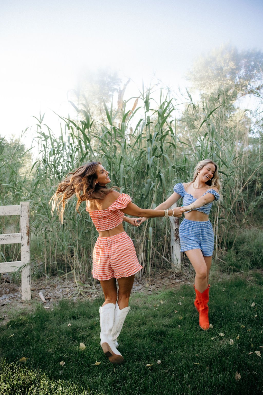 Lifestyle fashion photography featuring playful movement, colorful styling, and authentic personality in an outdoor setting. This editorial fashion photoshoot creates vibrant imagery for clothing brands, boutiques, advertising campaigns, websites, an