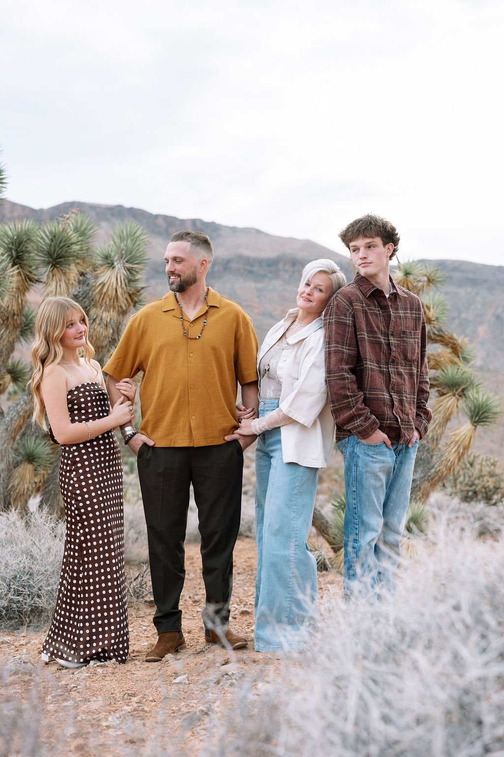 Lifestyle family photography capturing genuine connection and playful moments against the beautiful desert landscapes of Southern Utah. This St. George family photoshoot creates natural, timeless images filled with personality, laughter, and the auth