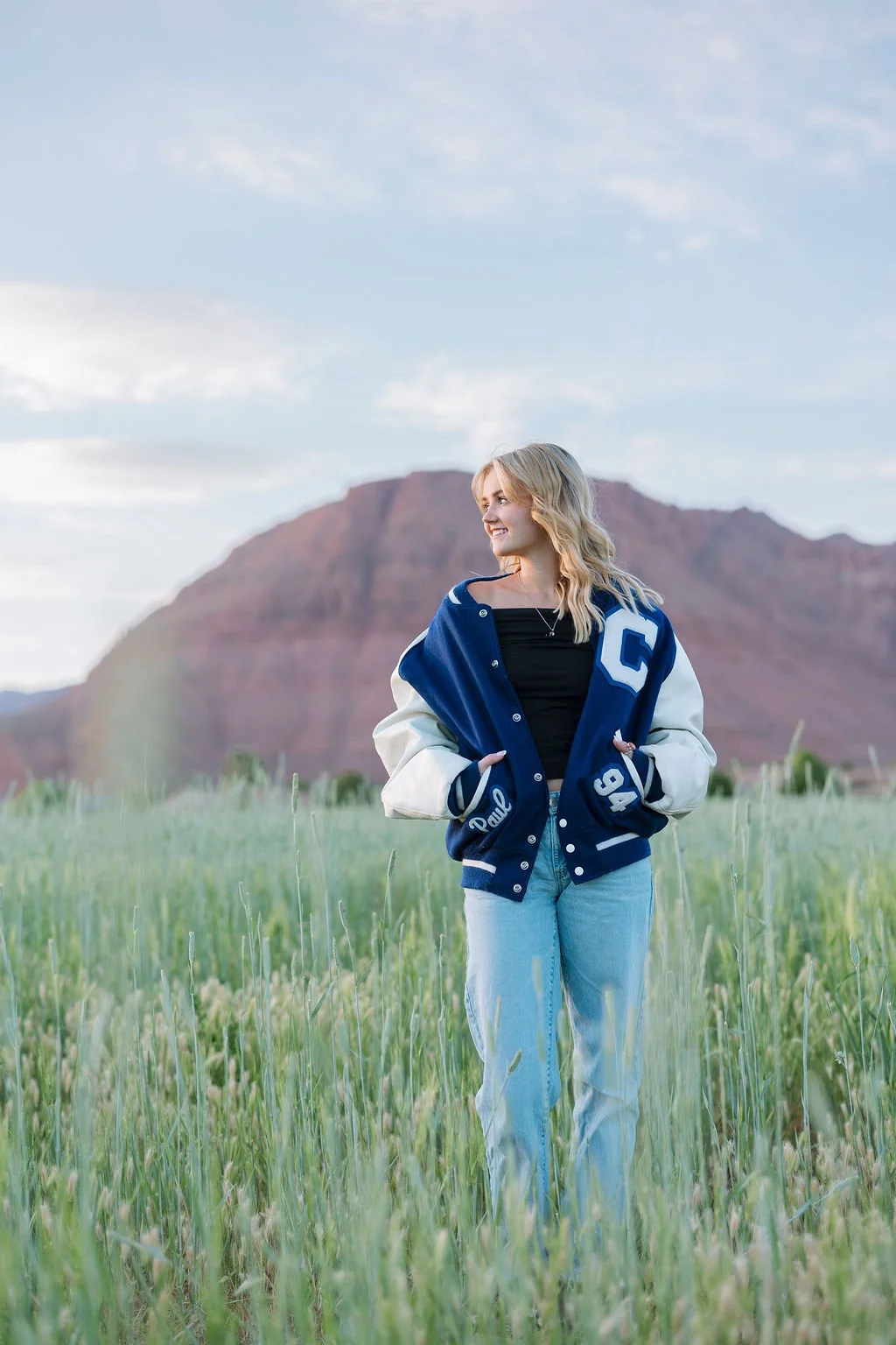 High school senior photography capturing a confident, natural portrait against the beautiful landscapes of Southern Utah. This St. George senior photoshoot creates authentic, timeless images that celebrate each graduating senior’s unique personality,