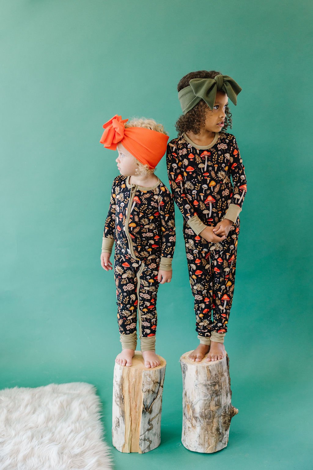 Children’s fashion photography in St. George, Utah featuring young models in colorful clothing styled in a creative studio setting. This playful editorial fashion photoshoot showcases children’s apparel through bold styling and imaginative imagery cr