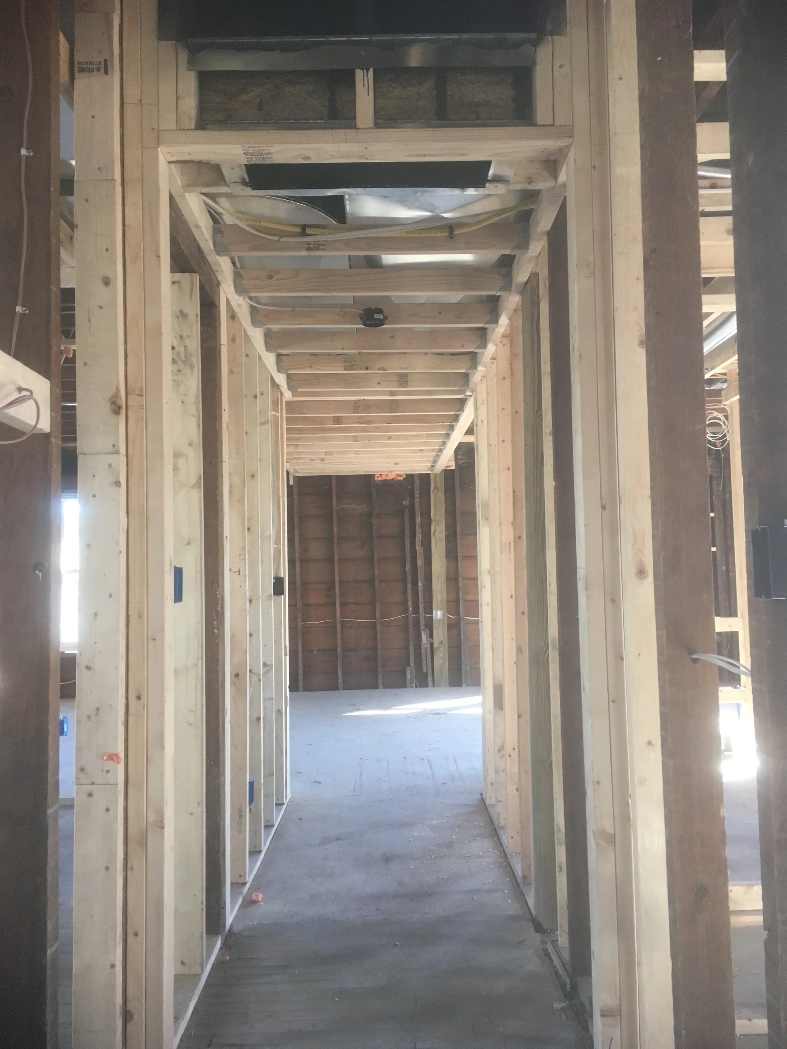 Hallway with soffit concealing hvac duct